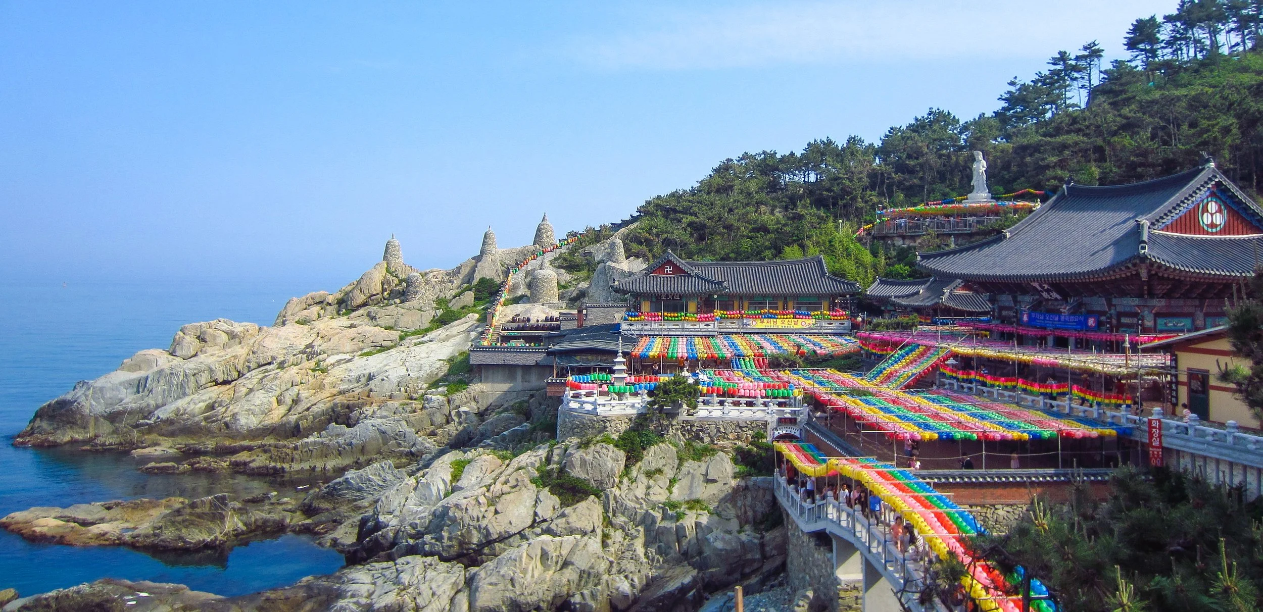 Haedong Yongkungsa Temple (also known as Haedong Yonggungsa) decorated with hundreds of colorful paper lanterns for Buddha's Birthday celebrations, Busan, South Korea