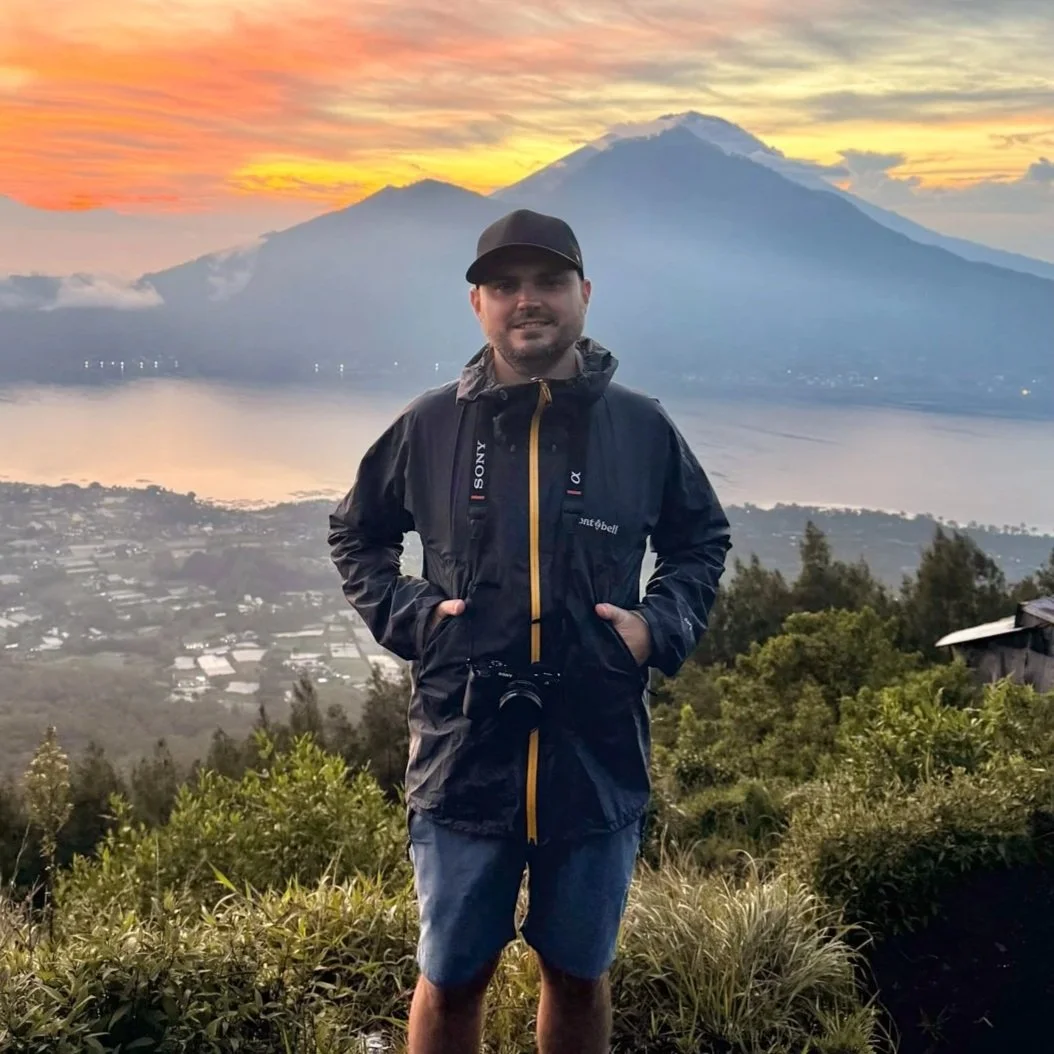 Travel advisor Kevin Miller at the summit of Mt. Batur volcano at sunrise, Bali, Indonesia