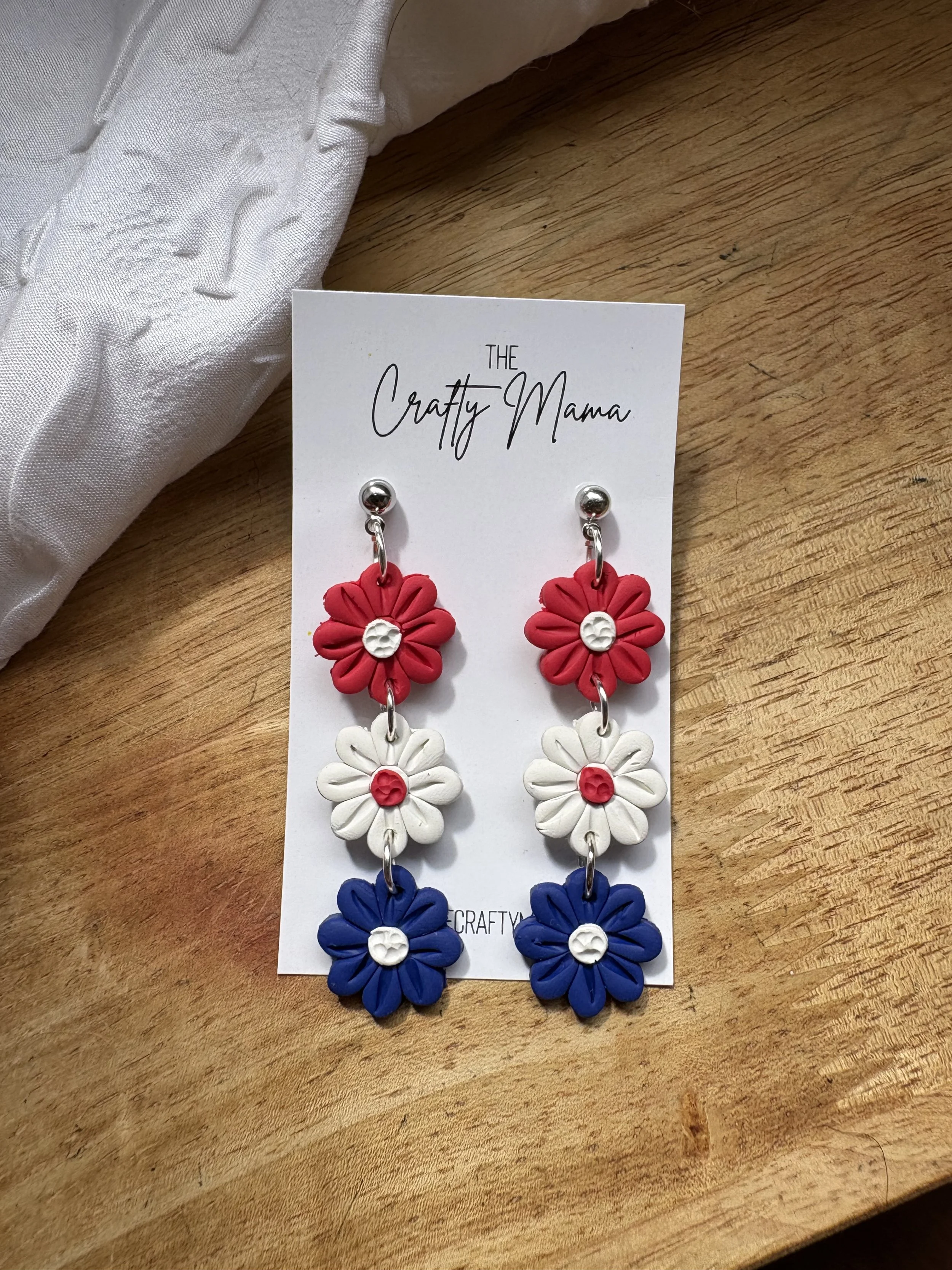Red white and blue flower trio