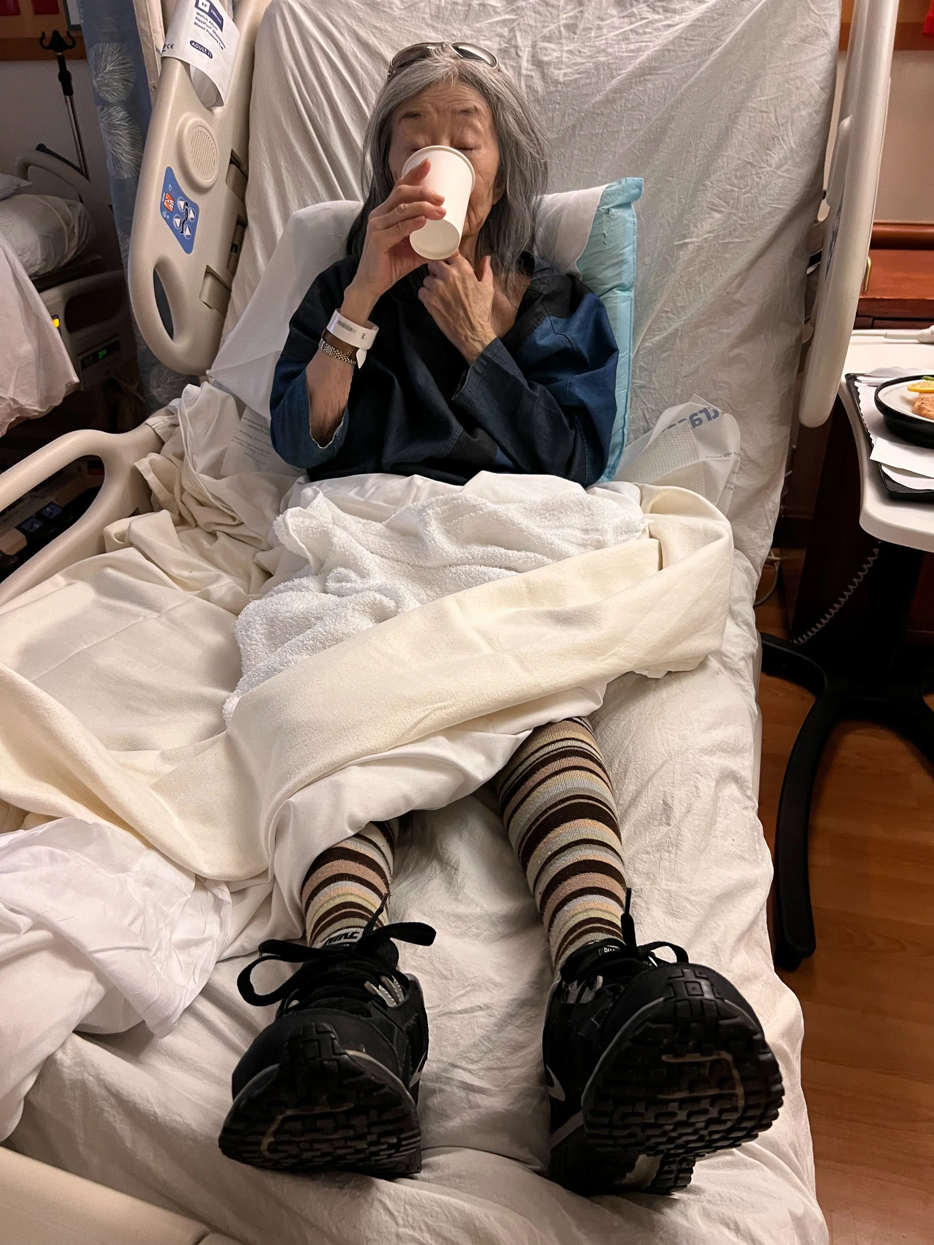 Omi hospital bed drink.jpg