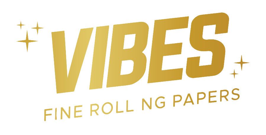 Logo for 'VIBES,' a fine rolling papers brand, in gold text with sparkling star accents, set against a black background.