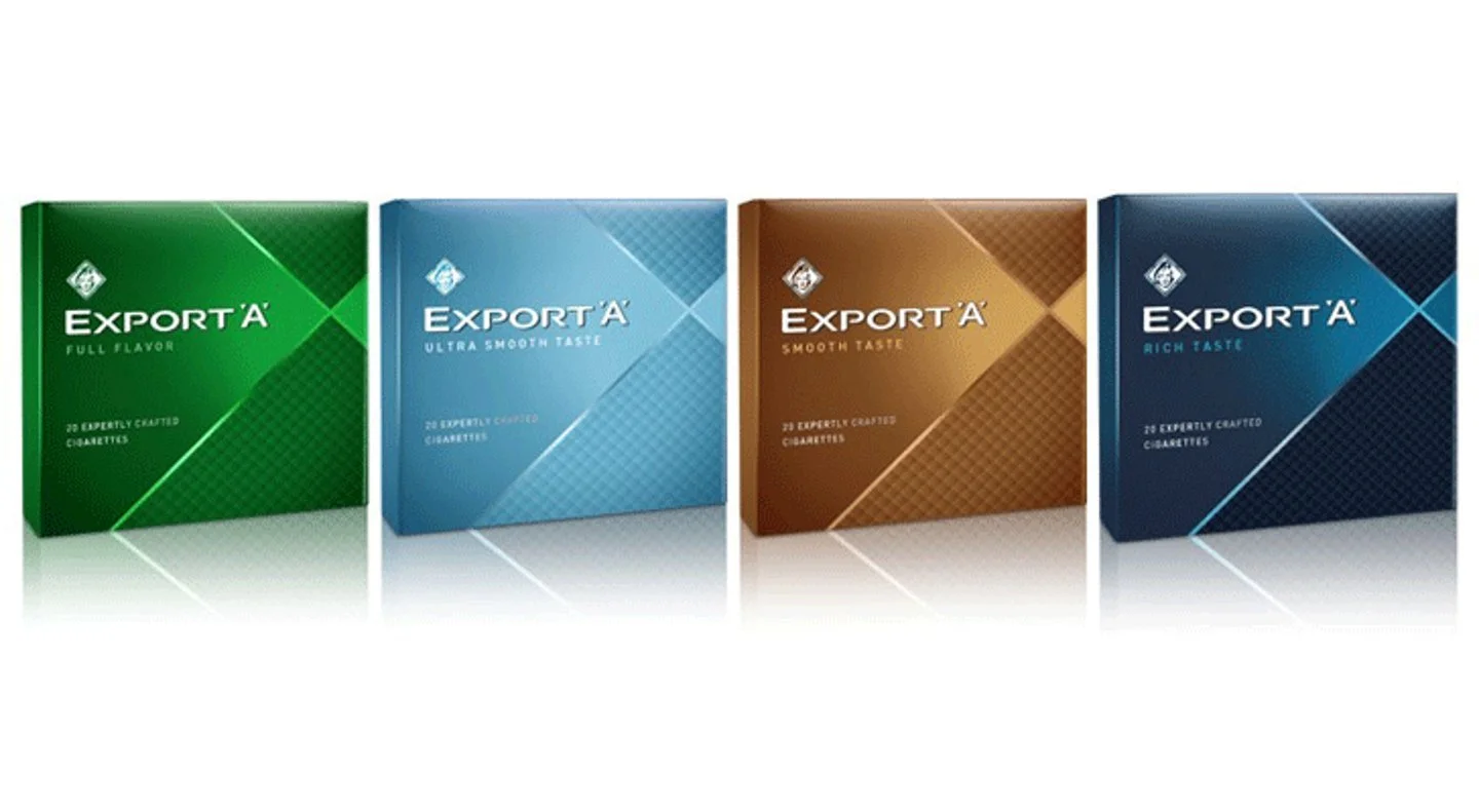 Four boxes of Export'A cigarettes in green, blue, brown, and dark blue packaging, labeled with different flavors and crafted details.