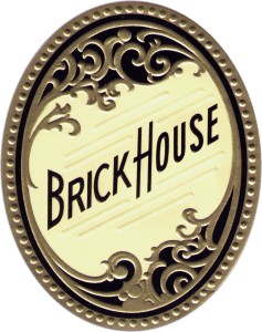 Sign reading Brick House with decorative black and gold border.