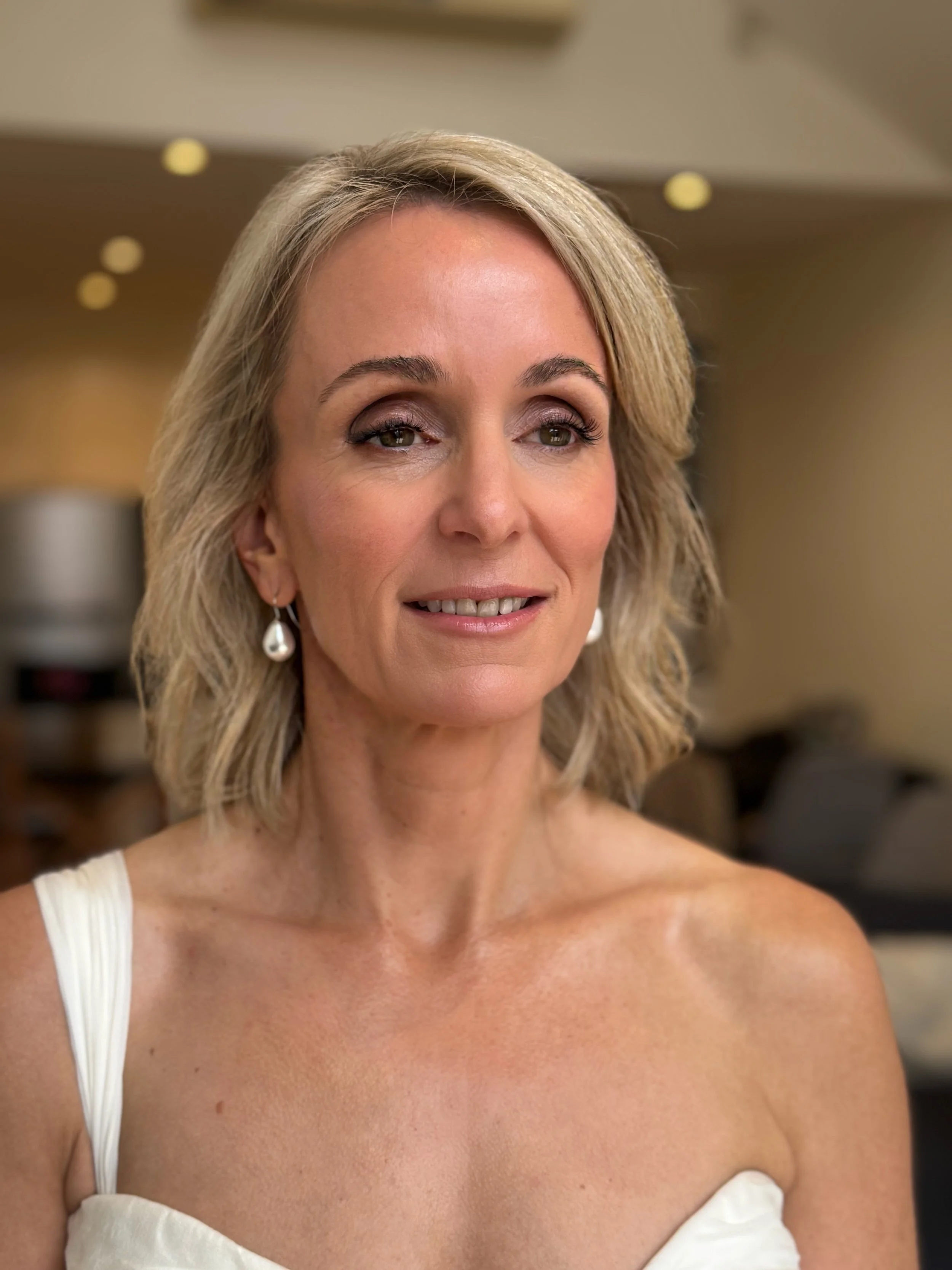 Makeup for a bride over 40 for her second wedding in Albert Park. Her bridal makeup is natural and radiant and suits her wedding dress perfectly.