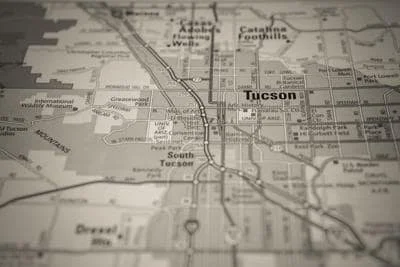 A black-and-white map of Tucson, showing streets, railroads, and surrounding areas. First Class Attorney Service is the best process server in Tucson