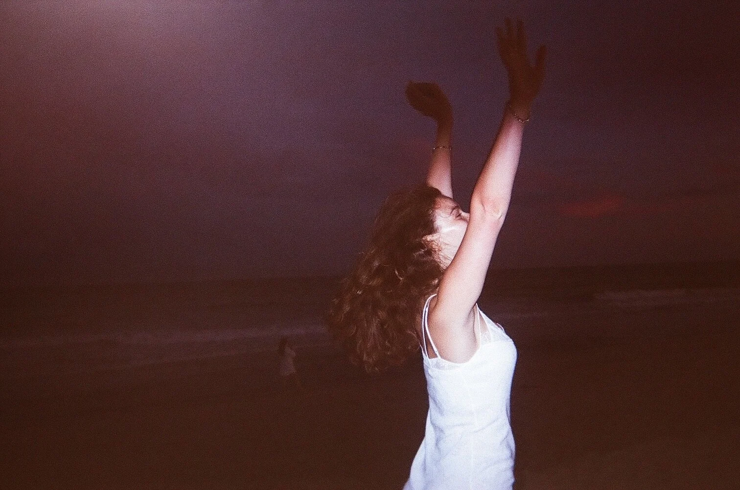 woman in white dress dancing