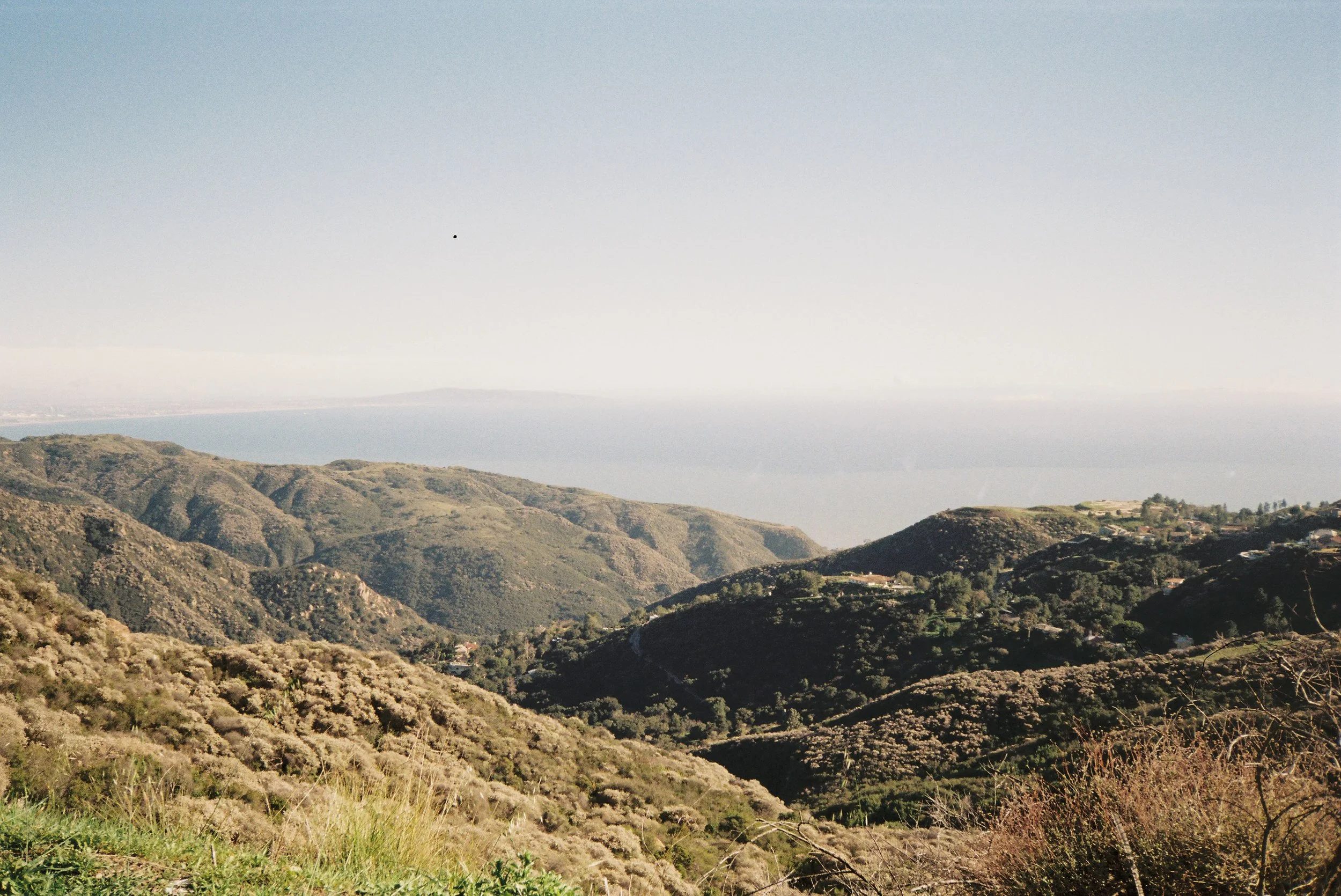 santa ynez mountains and blue skies meeting the ocean