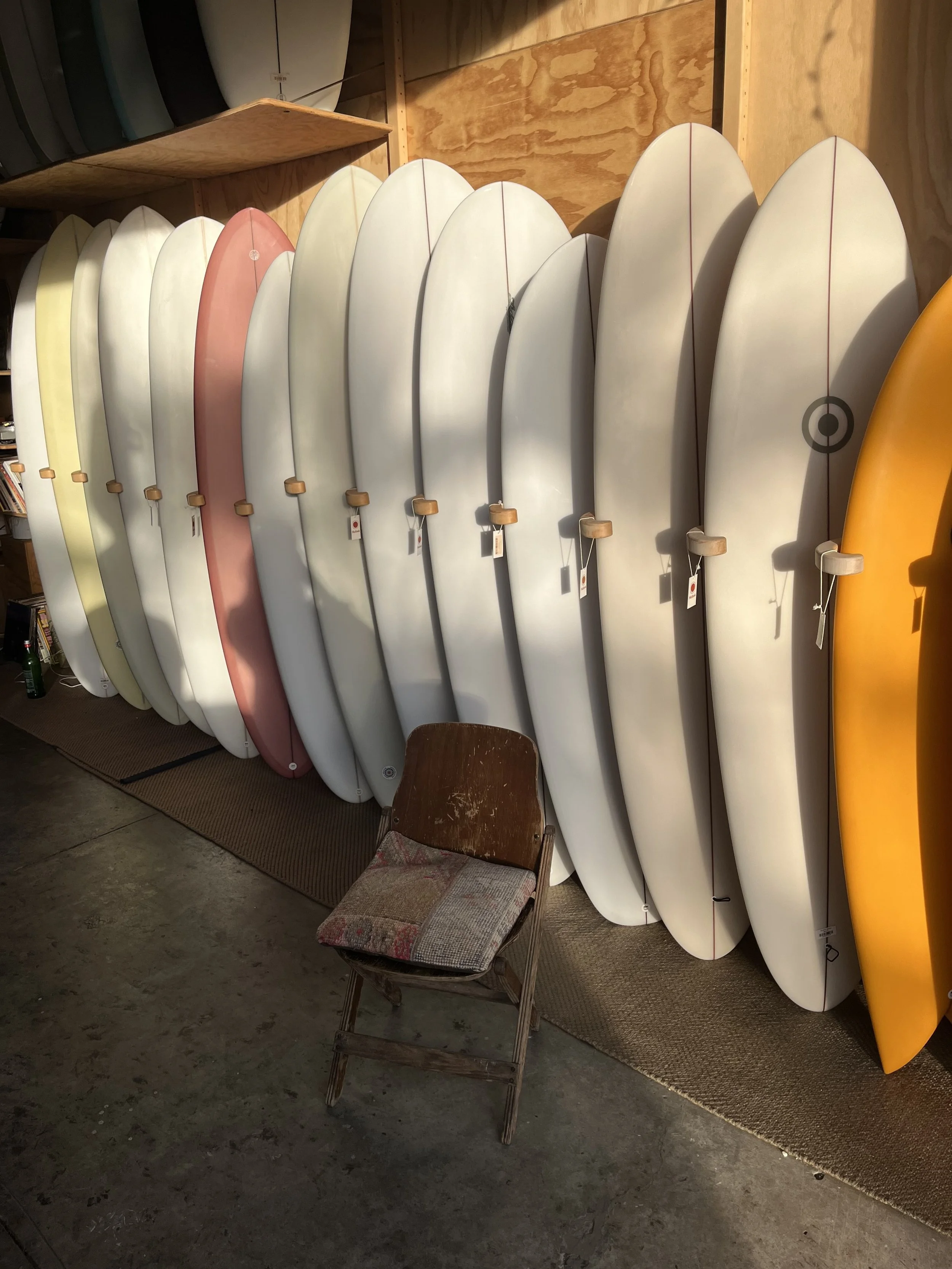 row of surf boards