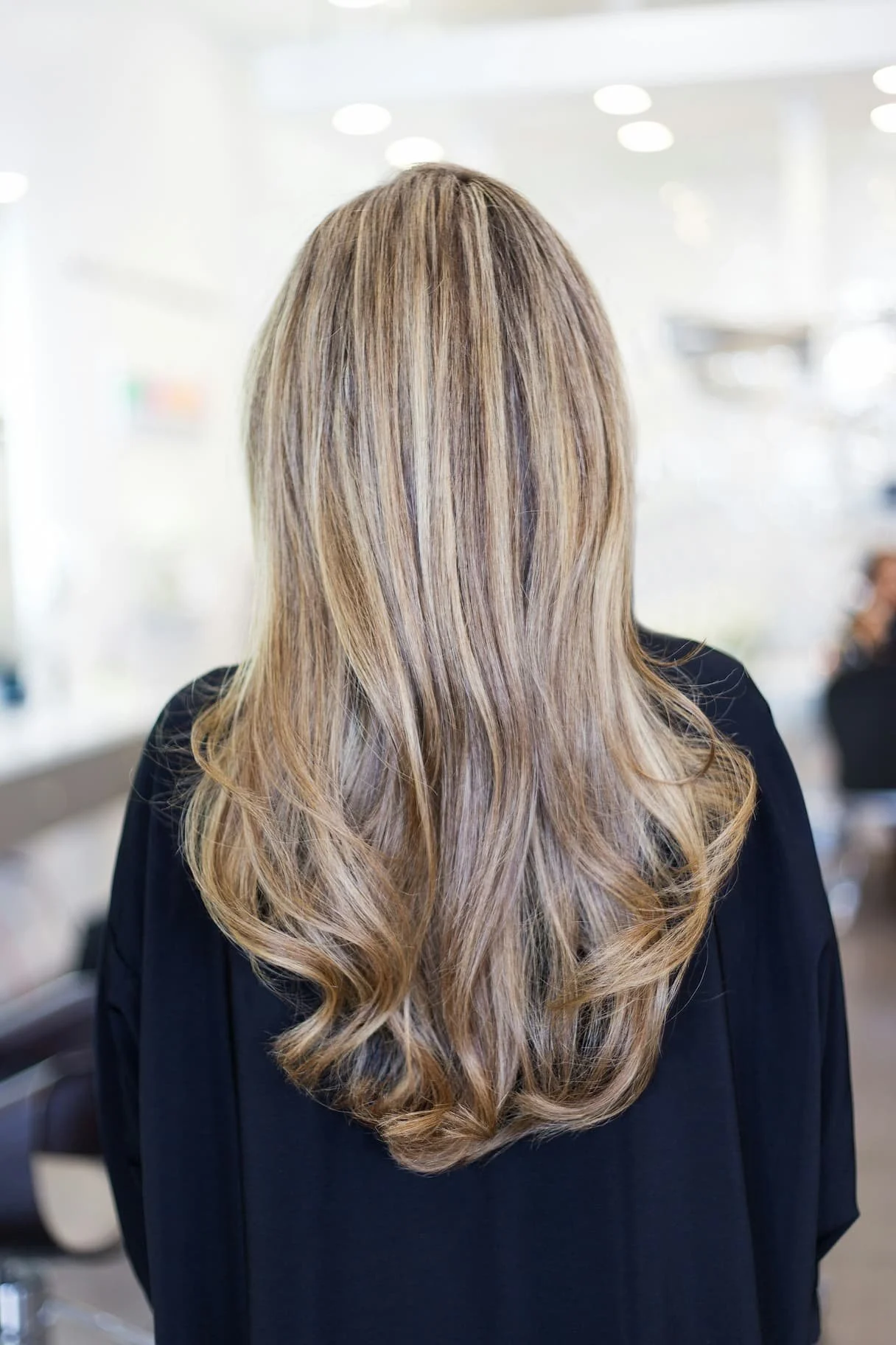 Bespoke hair colour service using professional Davines products at Maison Hair Studio