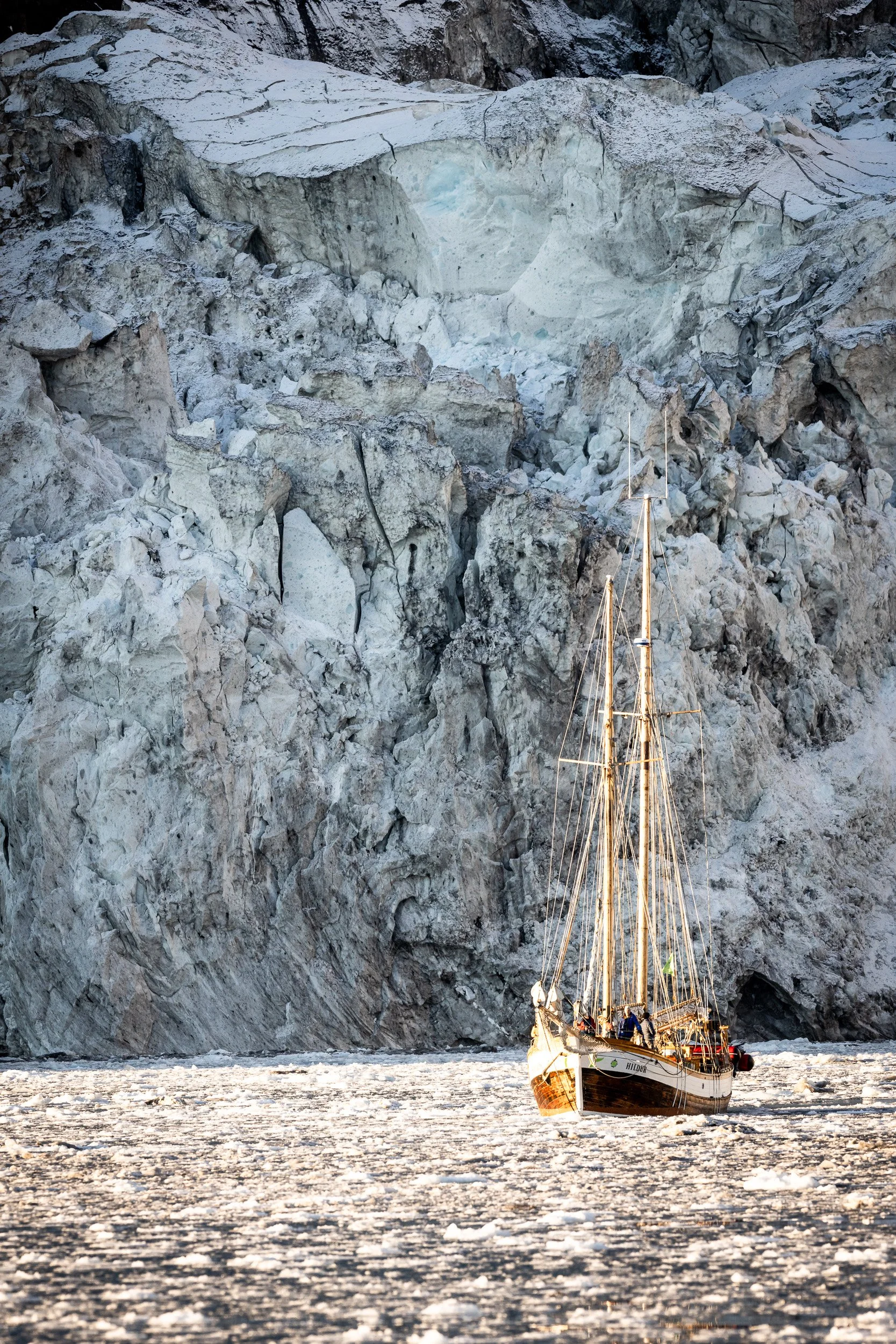 The sailing ship Hildur in front of the glacier - Greenland