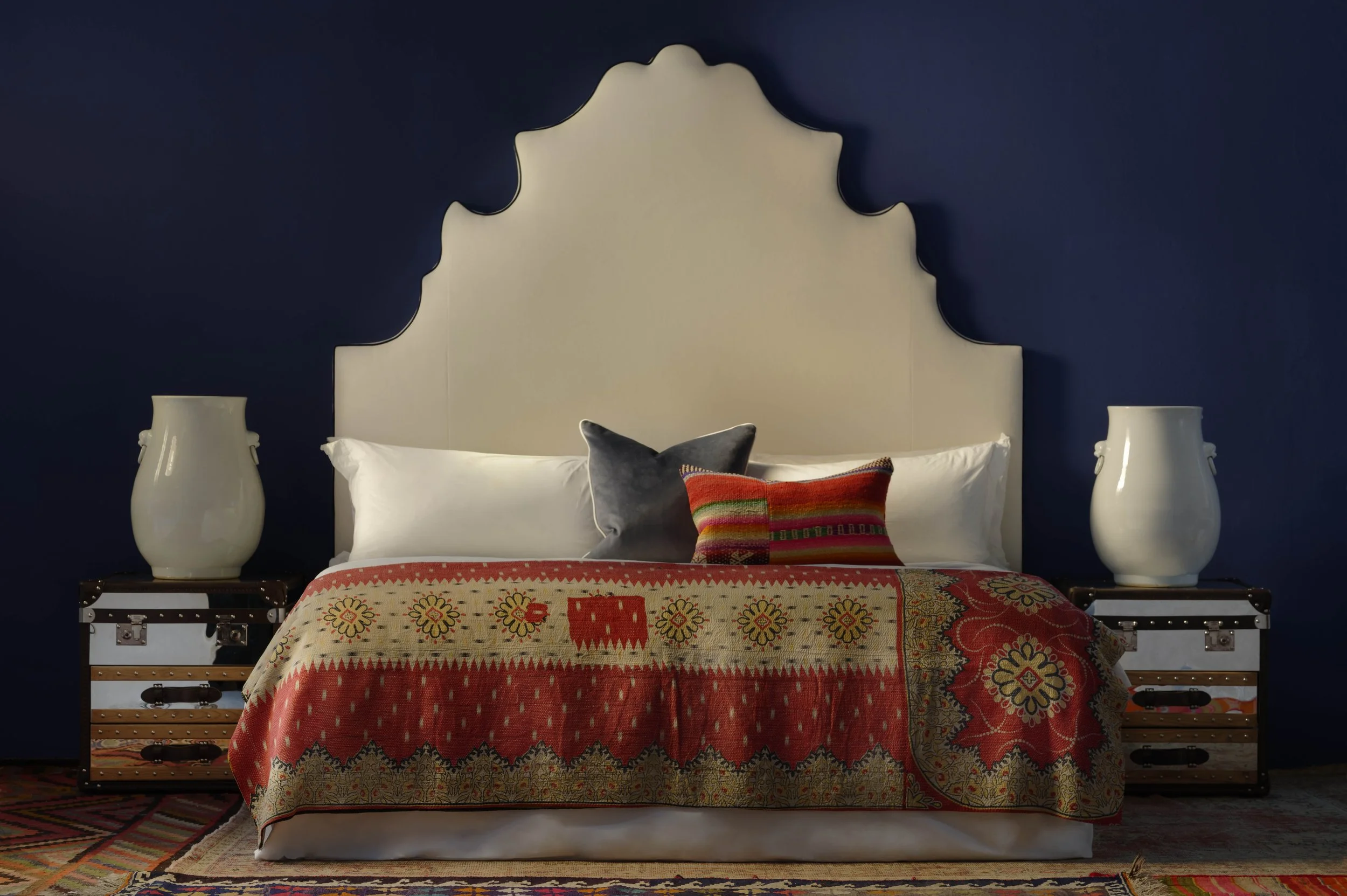 houdini_velvet_headboard_with_livingstone_steamer_trunks.jpg