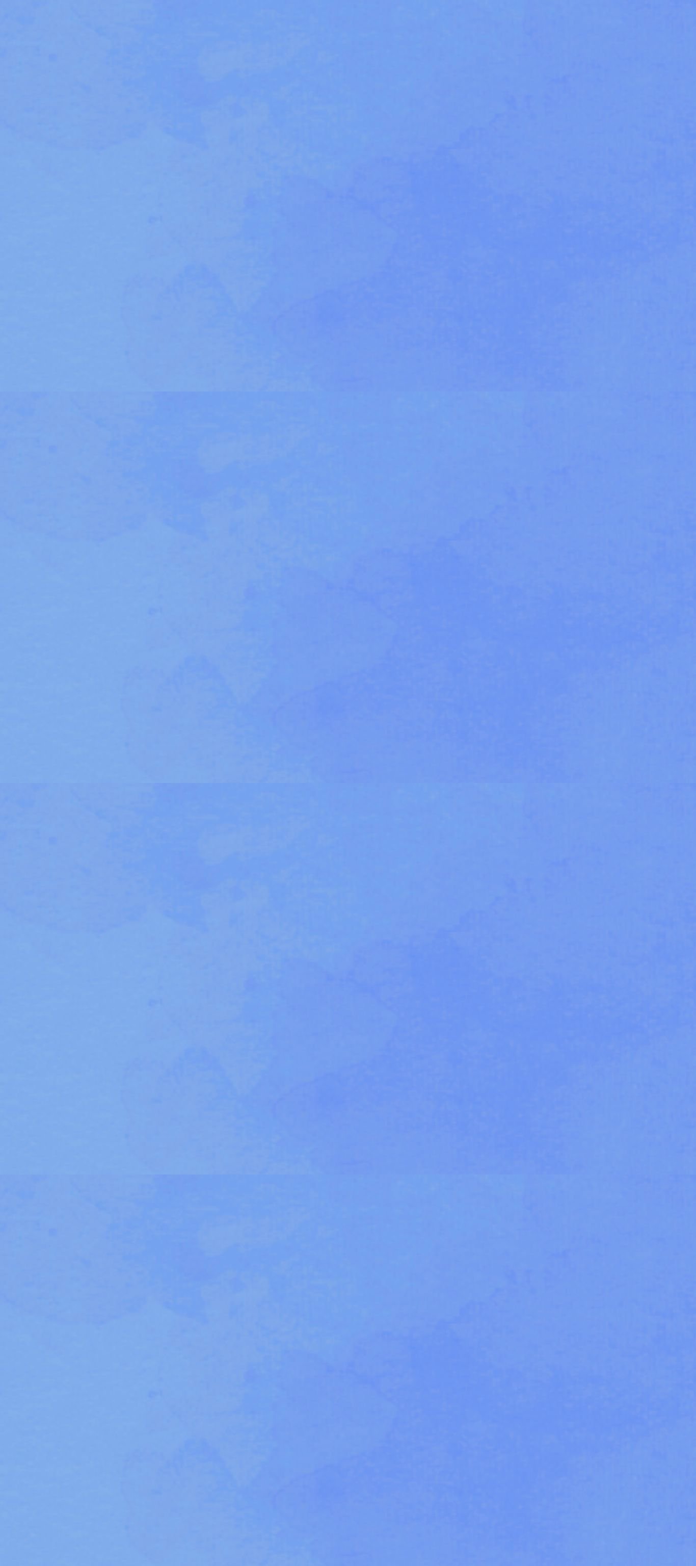 A clear blue sky with a few faint clouds.