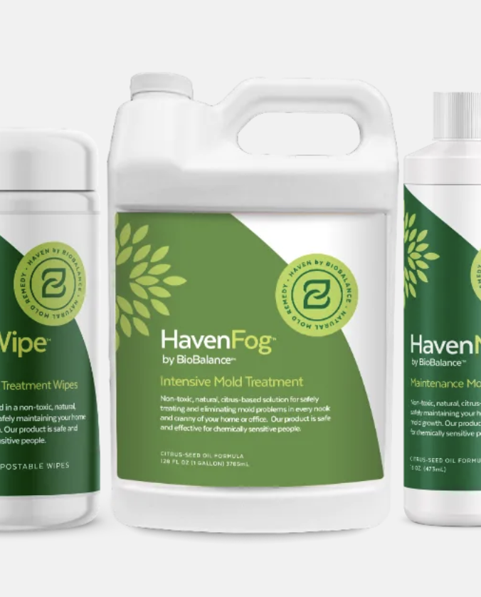 Various bottles of HavenFog mold treatment and maintenance solutions by BioBalance, including treatment wipes and spray, with green and white labeling.
