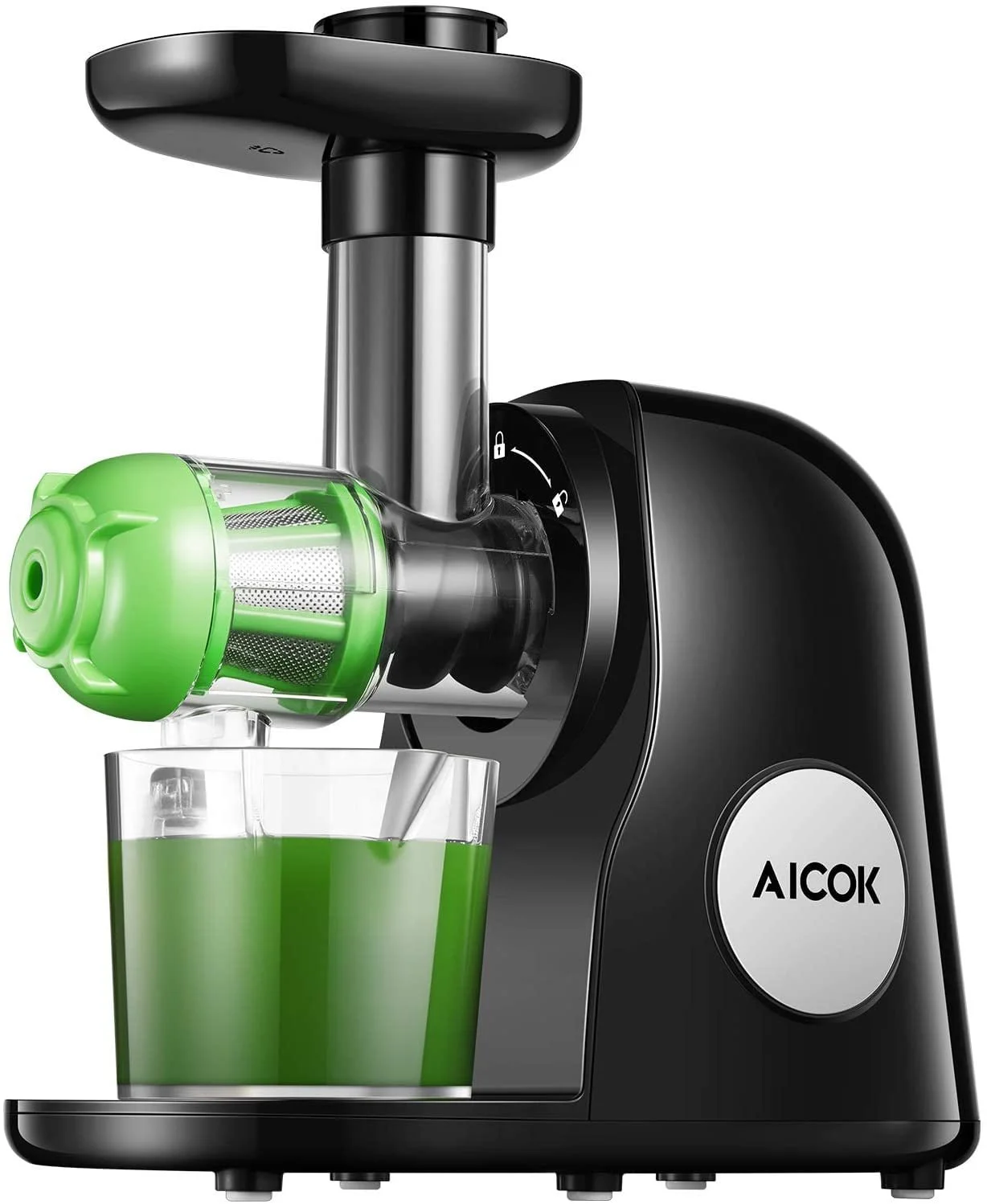 A black and silver juice extractor with a green filter, juicing green liquid into a clear glass.