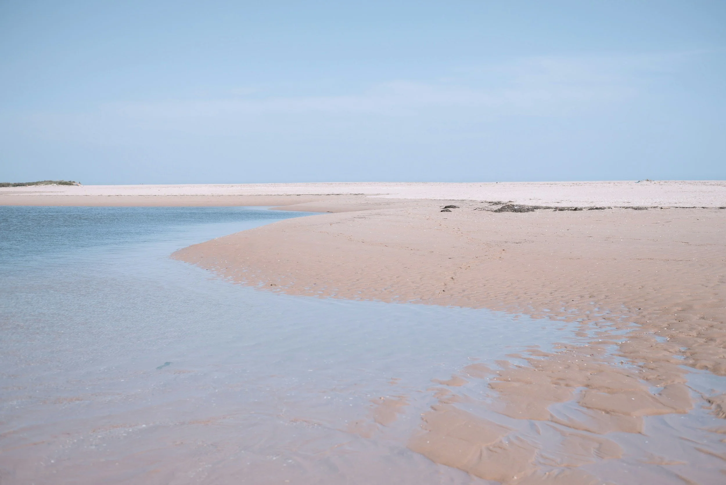 Calm ocean horizon representing slow and intentional travel