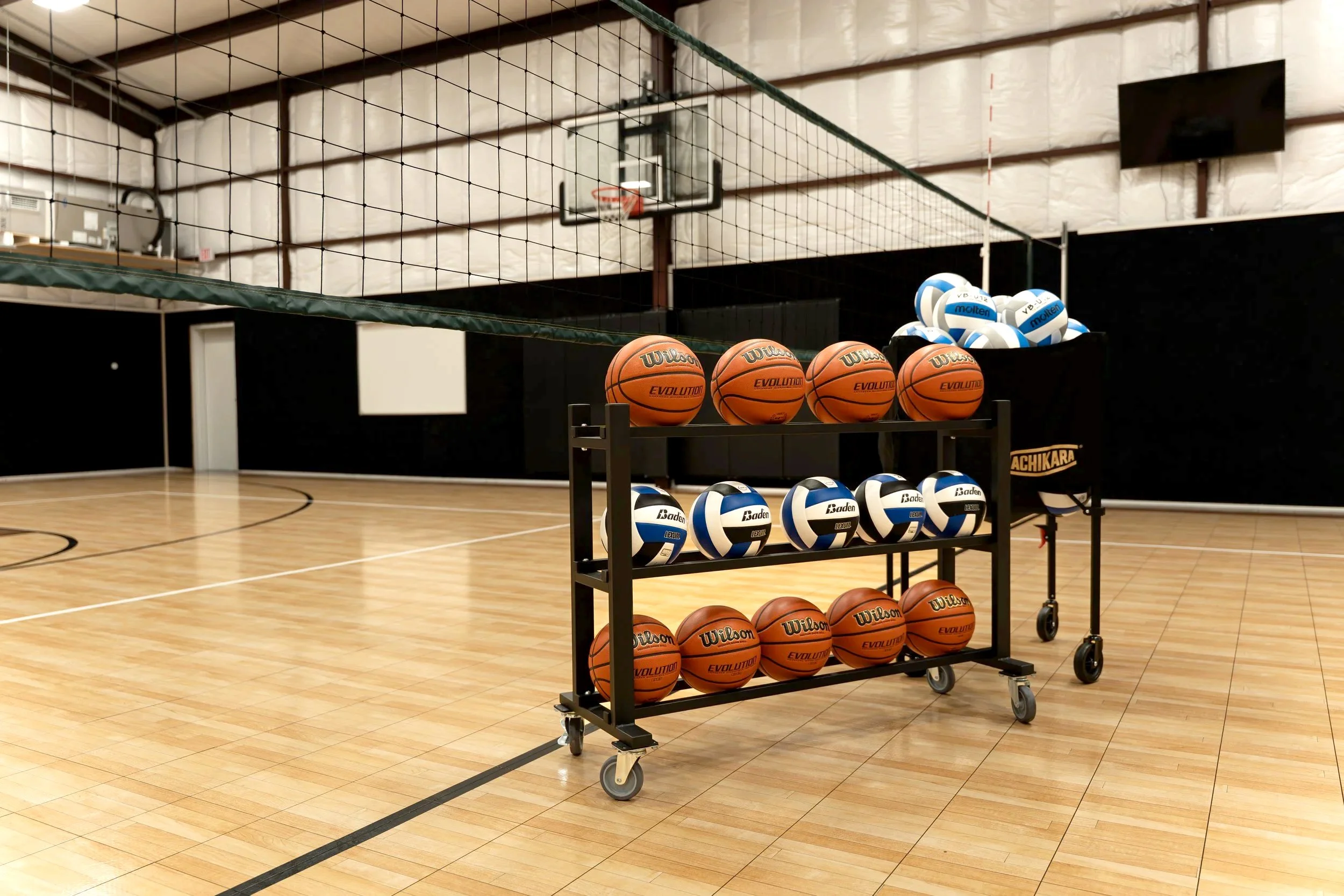 Indoor basketball and volleyball court rental at Dripping Springs Sports Club.