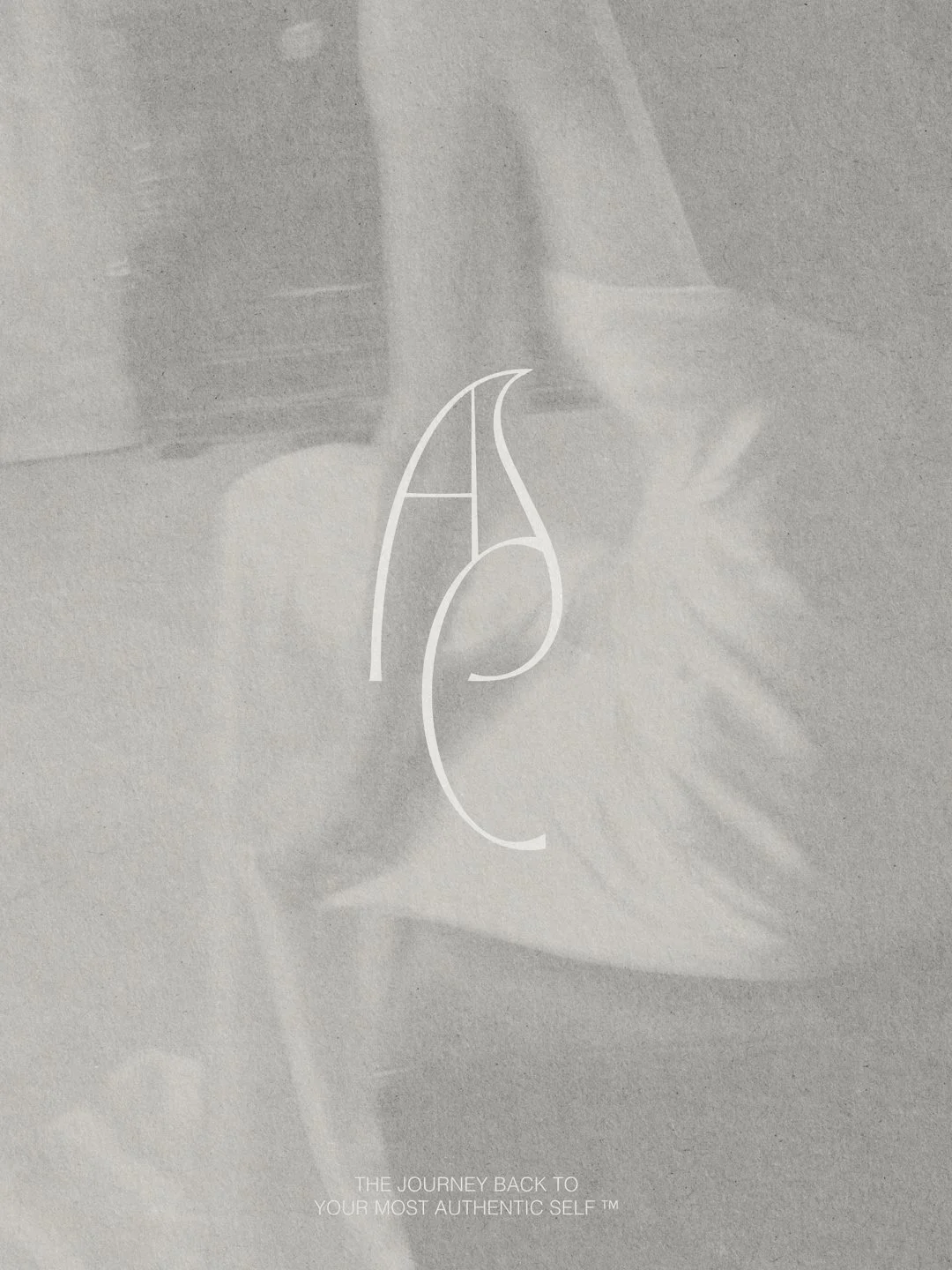 Minimalist design with a line drawing of a face with the letter A and P, and text that reads 'The journey back to your most authentic self'.