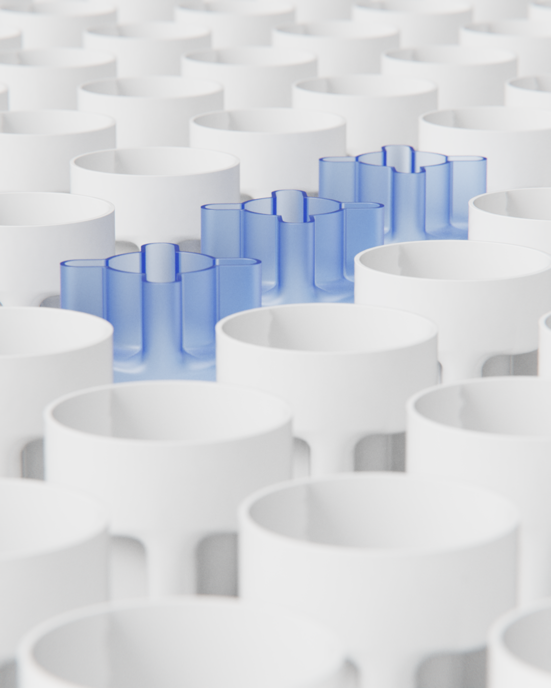 Close-up of a Lego brick set featuring white cylindrical bricks with a few blue transparent bricks in the center.