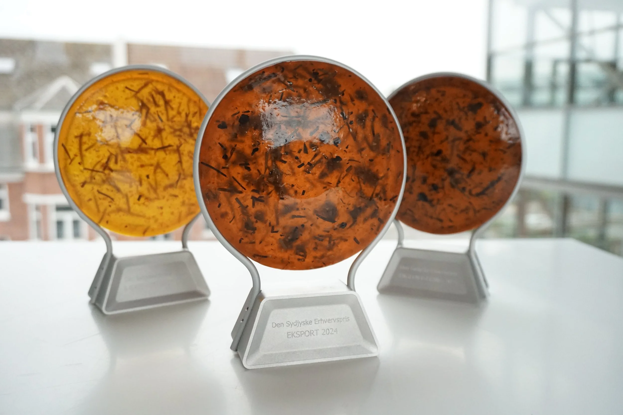 Three awards made in resin