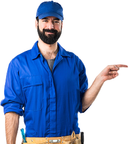 A man wearing a blue uniform and cap is holding a small glass, smiling, with a tool belt around his waist.