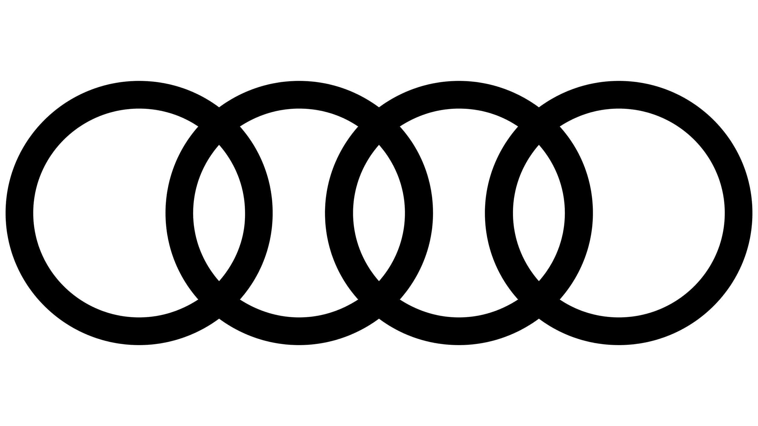 Close-up of multiple black Audi logo emblems on a dark background.