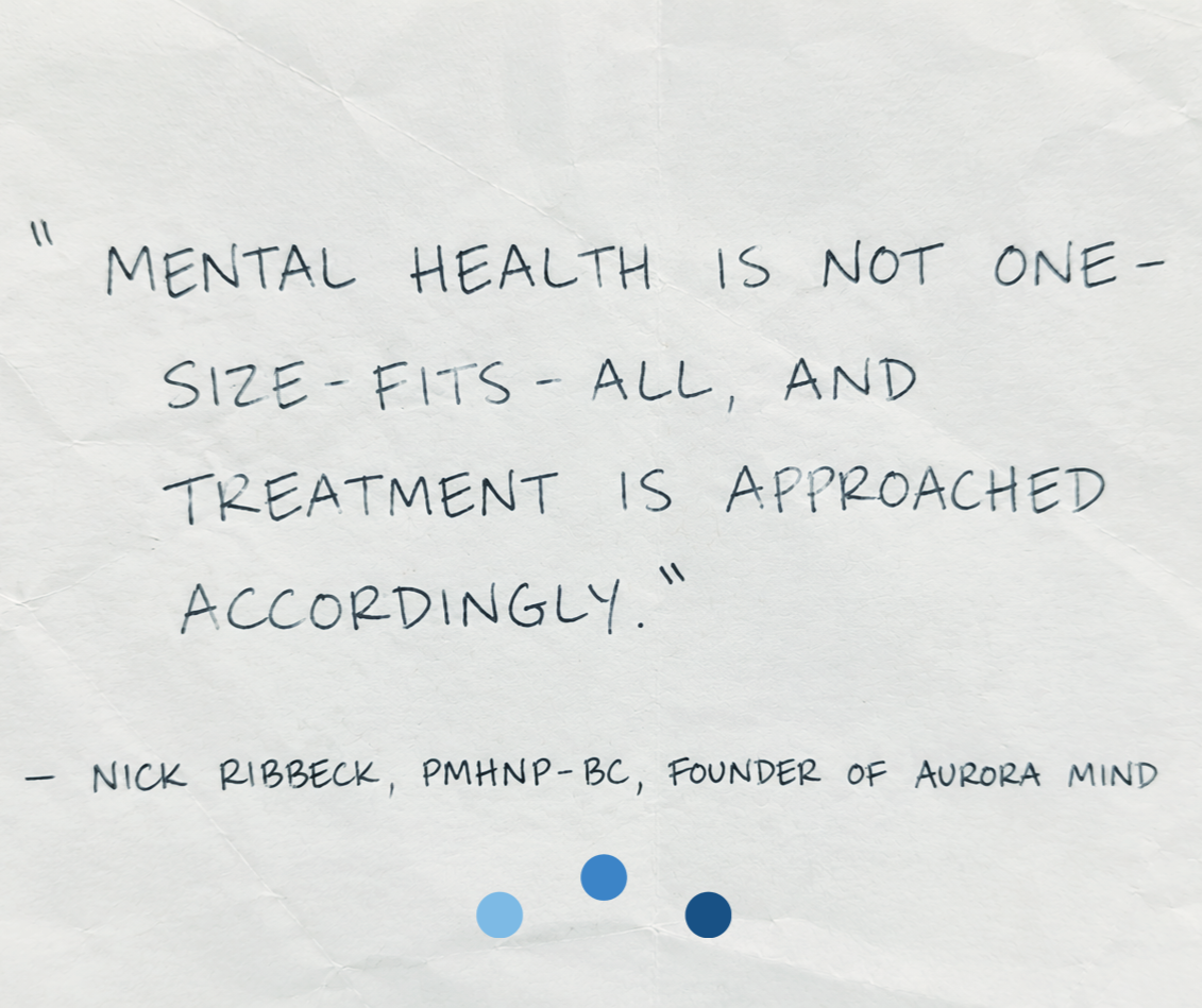 A handwritten quote on a crumpled white paper: "Mental health is not one-size-fit-all, and treatment is approached accordingly." - Nick Ribbeck, PMHNP-BC, founder of Aurora Mind. There are three shades of blue dots at the bottom of the paper.