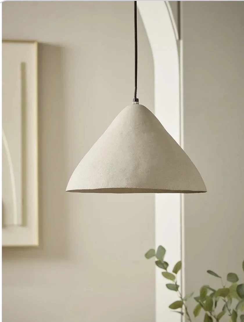 ceramic-light-pendant-textured-luxury-interiors.webp