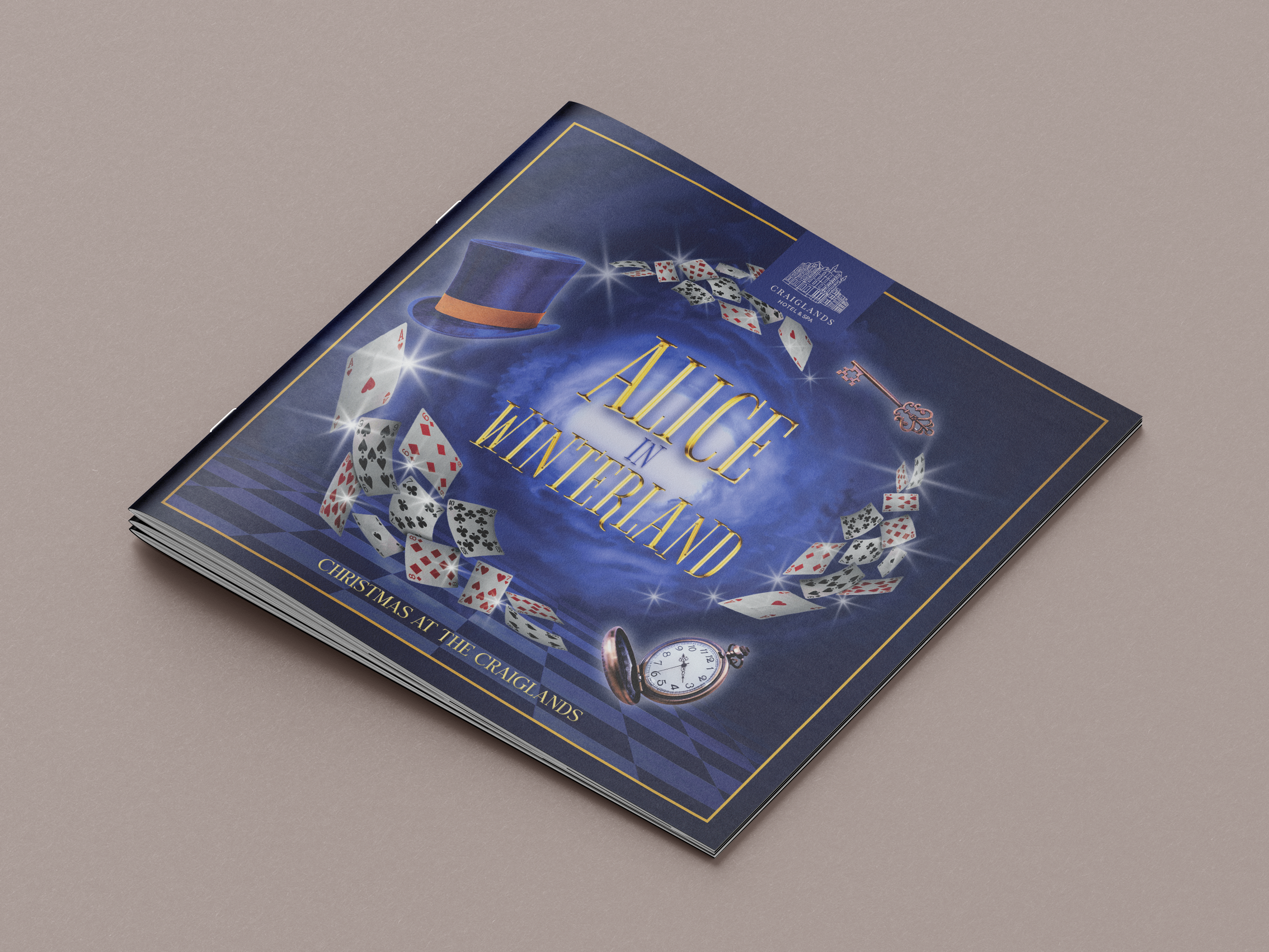 A promotional booklet titled "A LICH IN WINTERLAND" features a blue background with a top hat, a key, a pocket watch, and scattered playing cards with sparkles around them, and the subtitle "CHRISTMAS AT THE CRAIGLANDS."