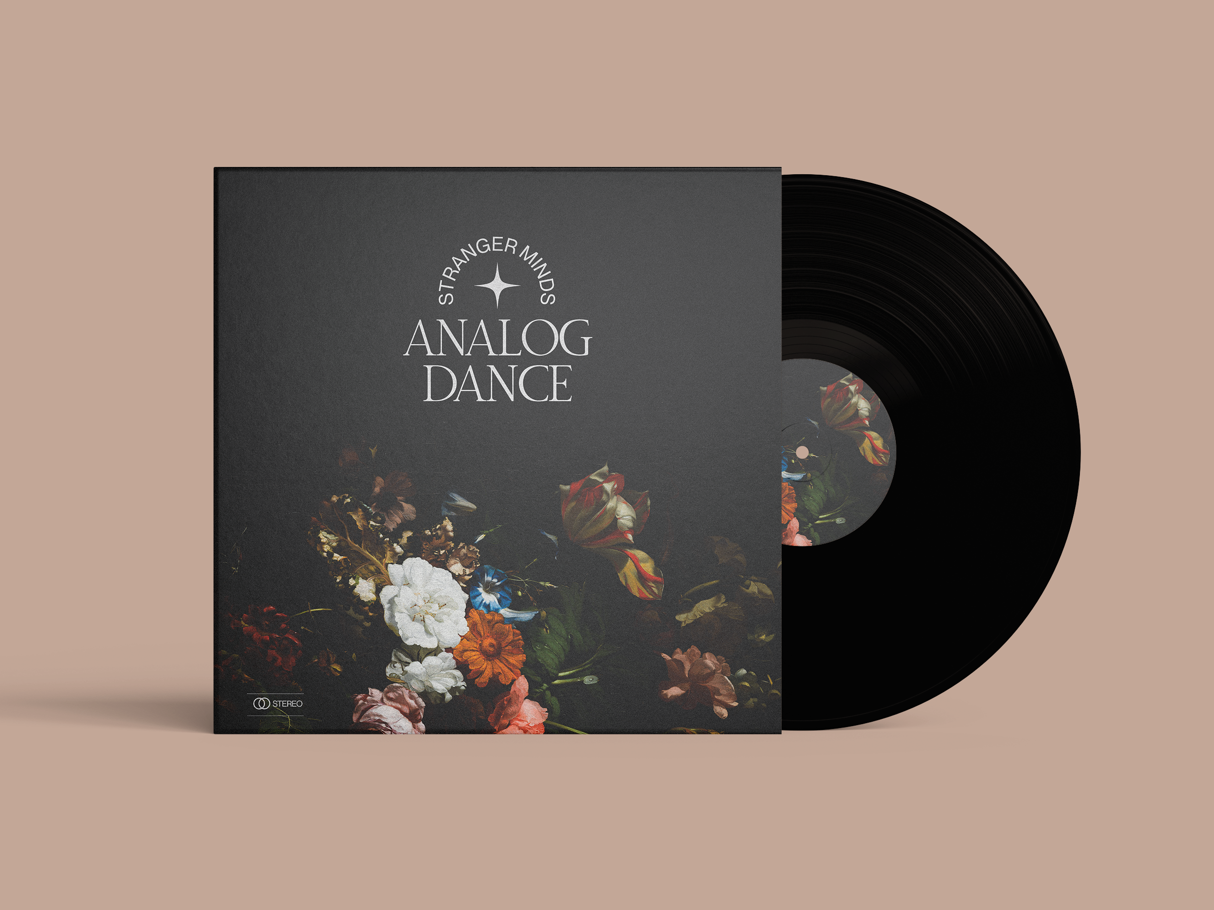 Black vinyl record partially out of its album cover with floral artwork and the text 'Stranger Minds Analog Dance' on a beige background.