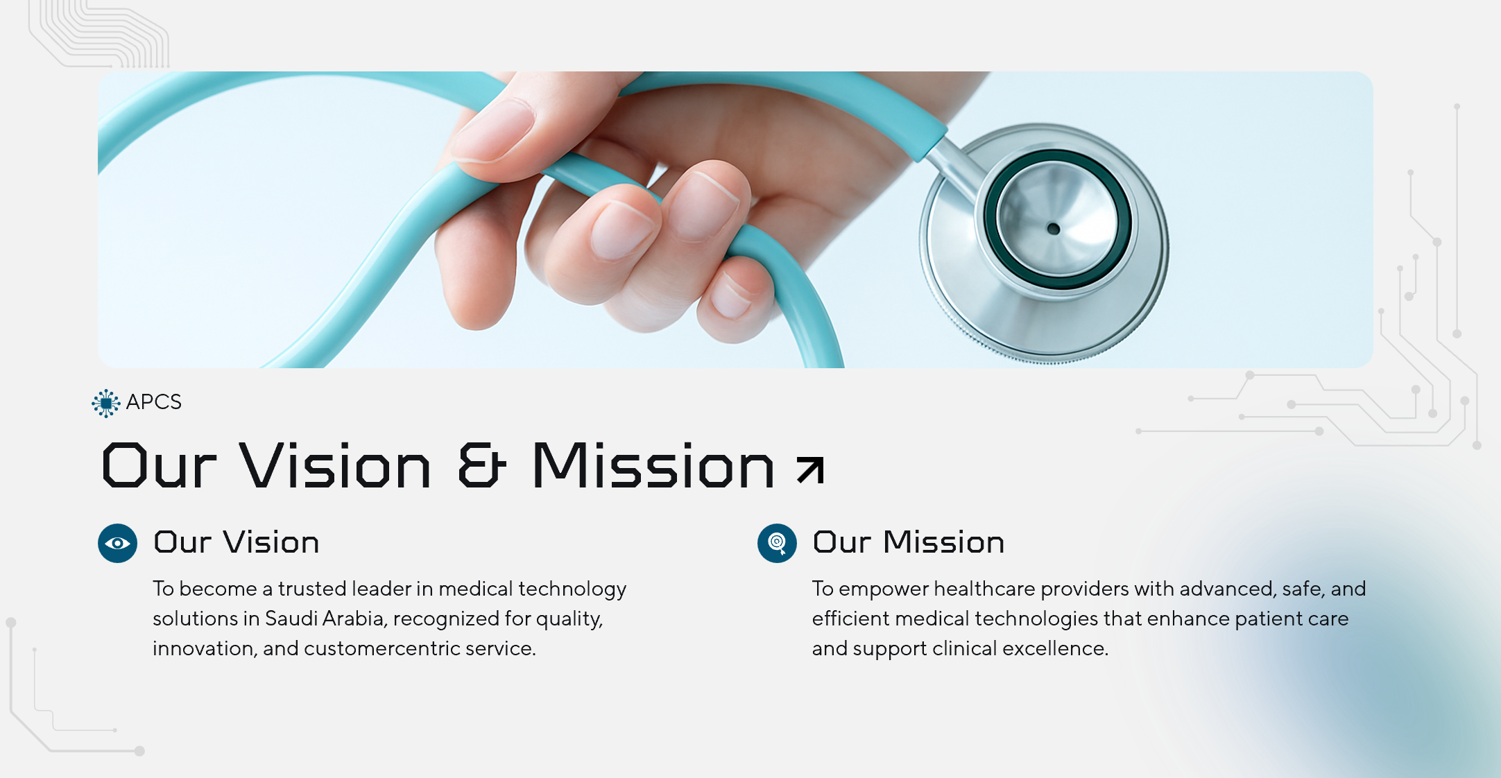 A close-up of a person's hand holding a stethoscope with a silver chest piece and a light blue tube, set against a light background.