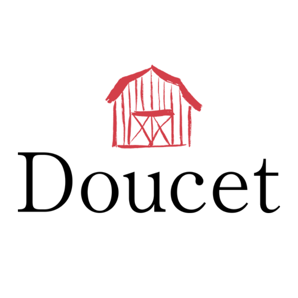 Black T-shirt with a red barn graphic in the center.