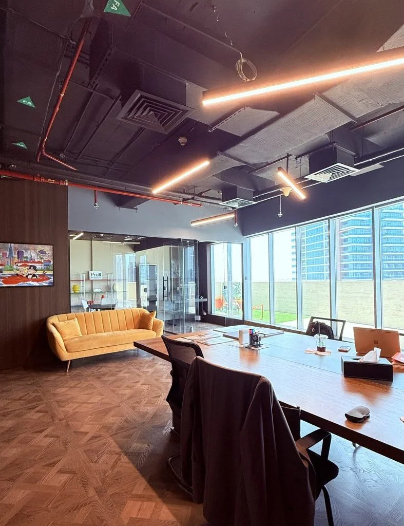 Pro8 Real Estate office in Business Bay, Dubai — off-plan advisory team workspace