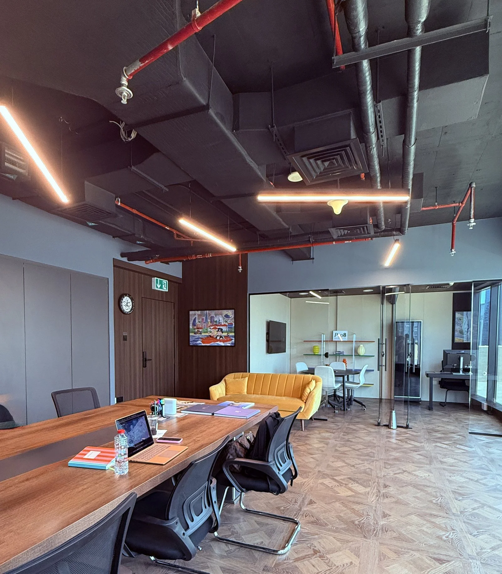 Pro8 Real Estate office in Business Bay, Dubai - the off-plan advisory team at work