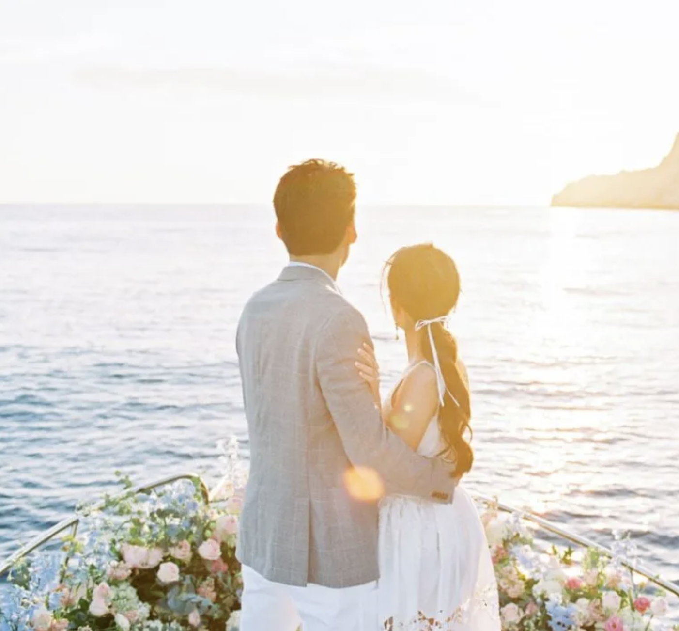 Romantic private boat proposal set-up at sunset in the Ionian Islands by Almyra Ithaca. Bespoke romantic event and wedding proposal on a private boat in Ithaca, Greece.