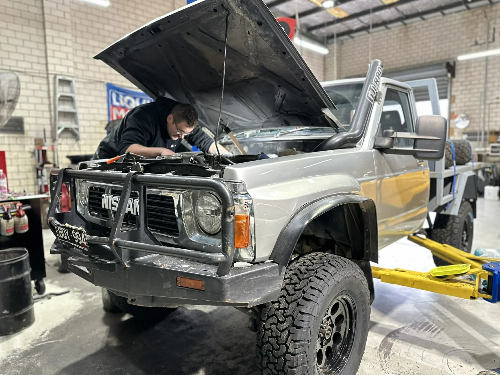 Mechanic carrying out a pre-purchase inspection in Ringwood