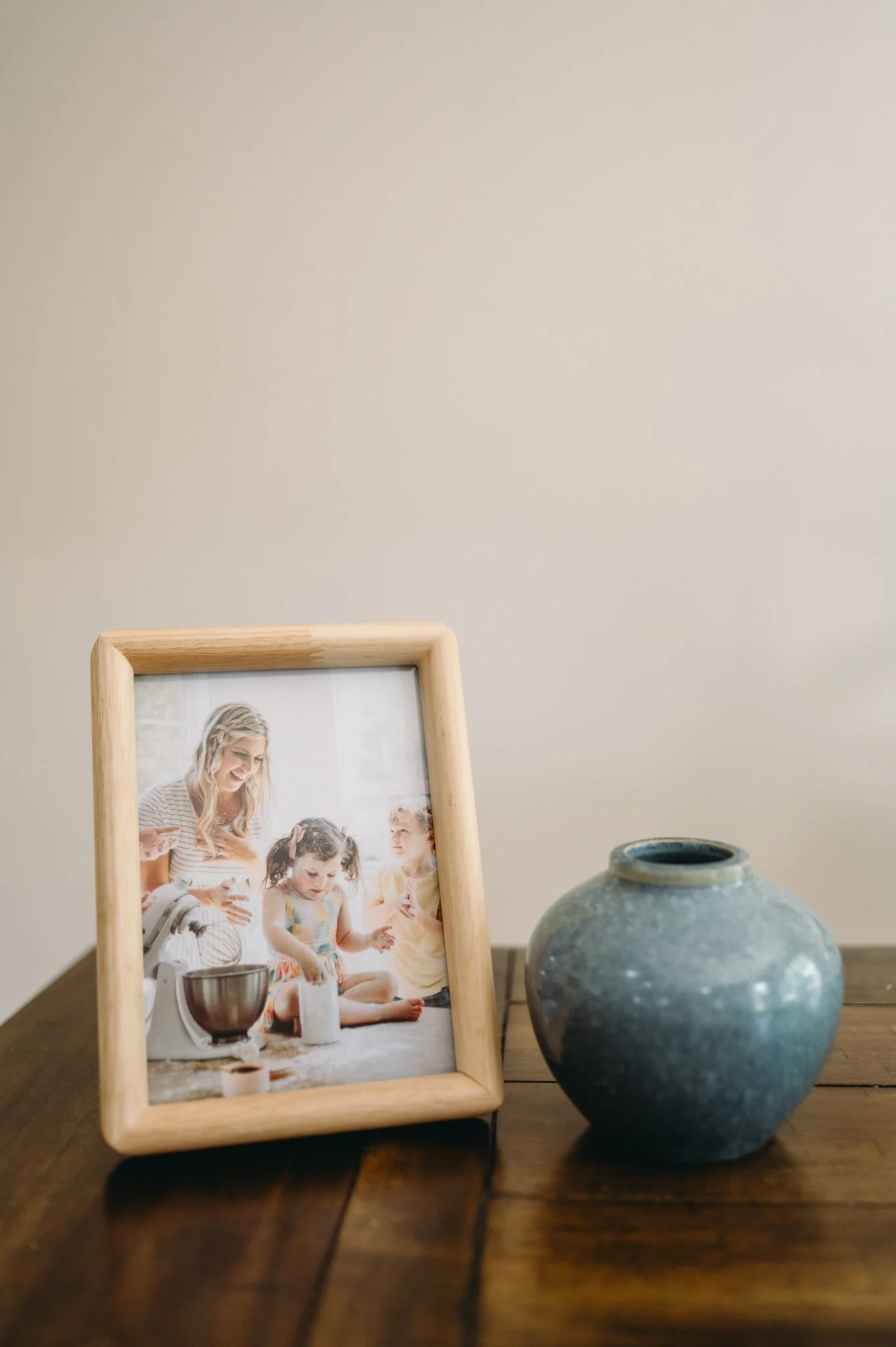 Framed family portrait on deep matte paper displayed in a Bend, Oregon home.