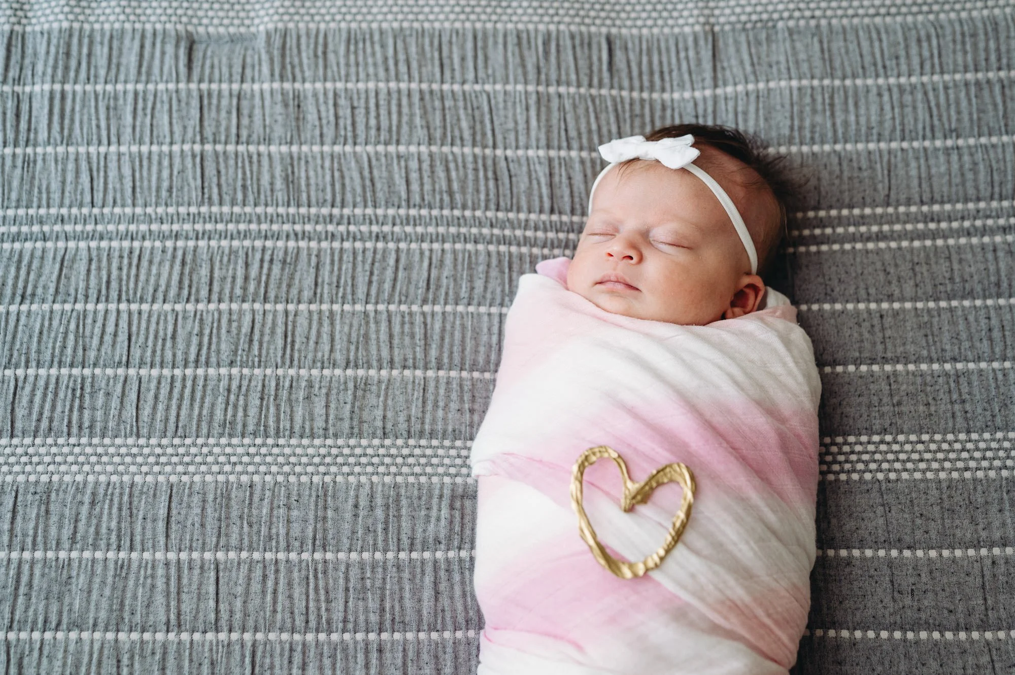 pink-swaddle-lifestyle-newborn-bend-oregon.jpg