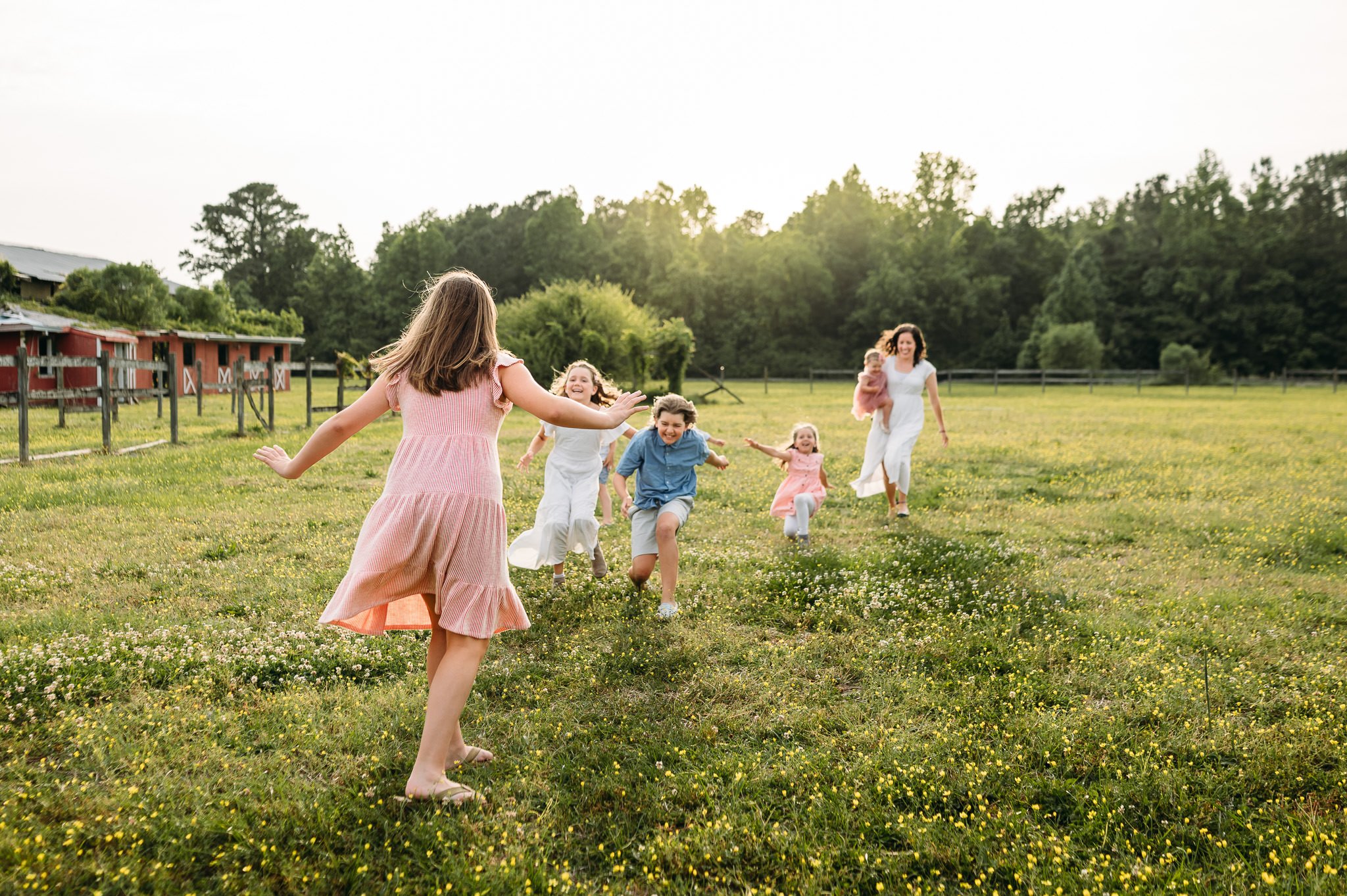 kids-playing-ranch-field-goldenhour-photo.JPG