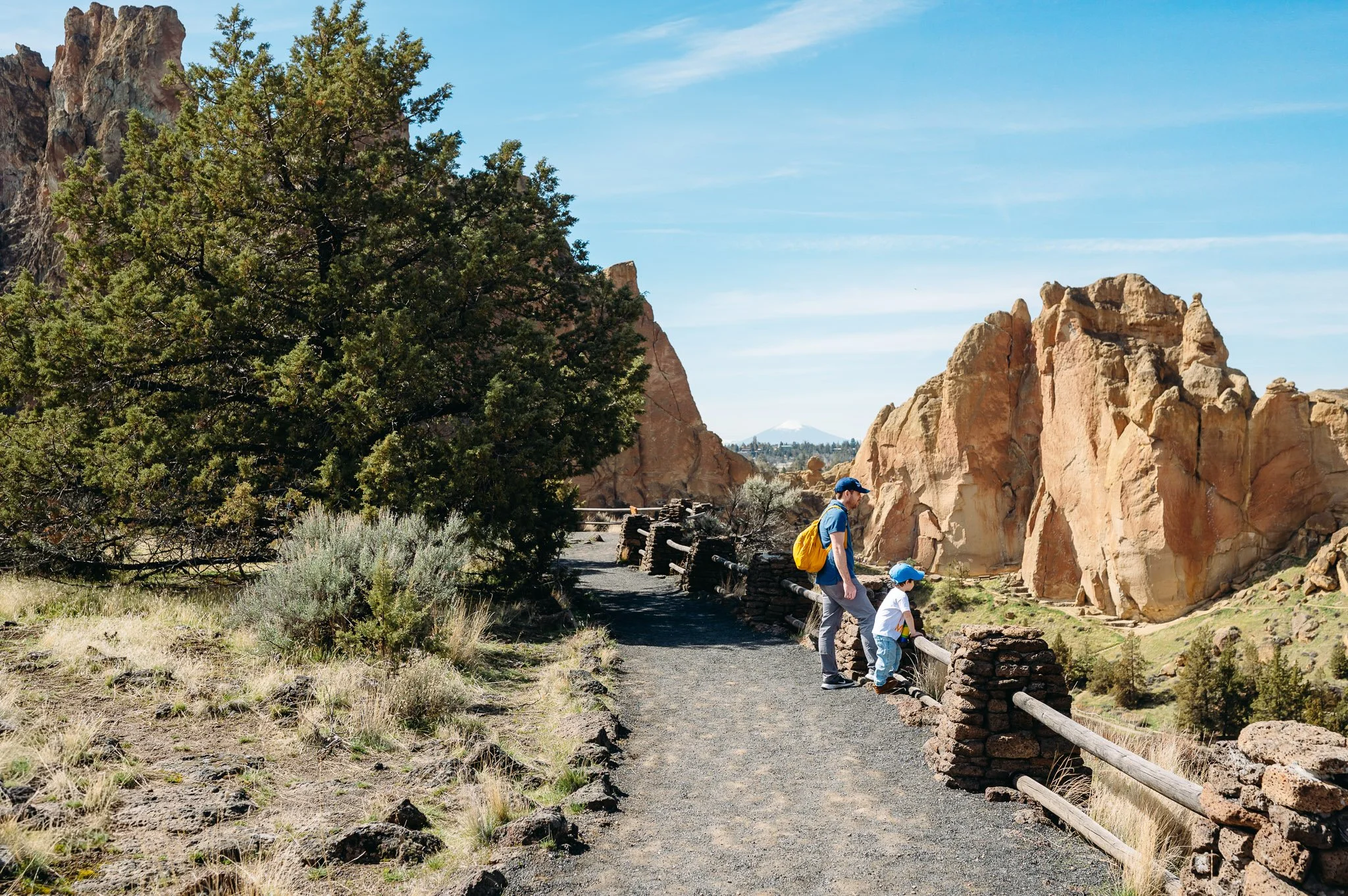 Photo of father and son hiking in Smith Rock State Park, by Elise Souders, Photographer