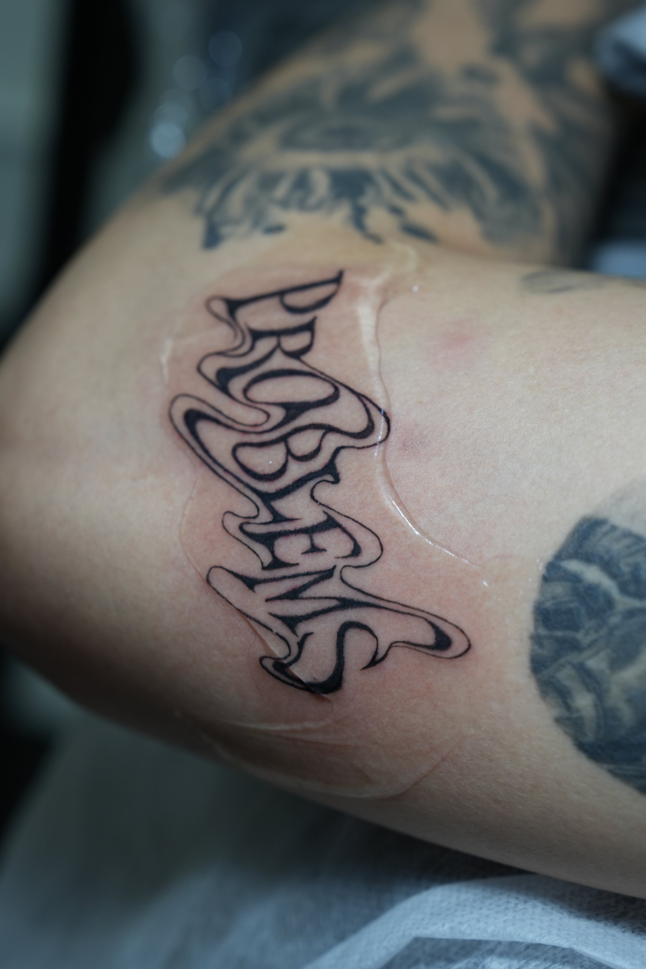 รอยสักฟอนต์สไตล์ Blackwork Lettering / Blackwork lettering tattoo by Let’s Tatt Studio Chiang Mai