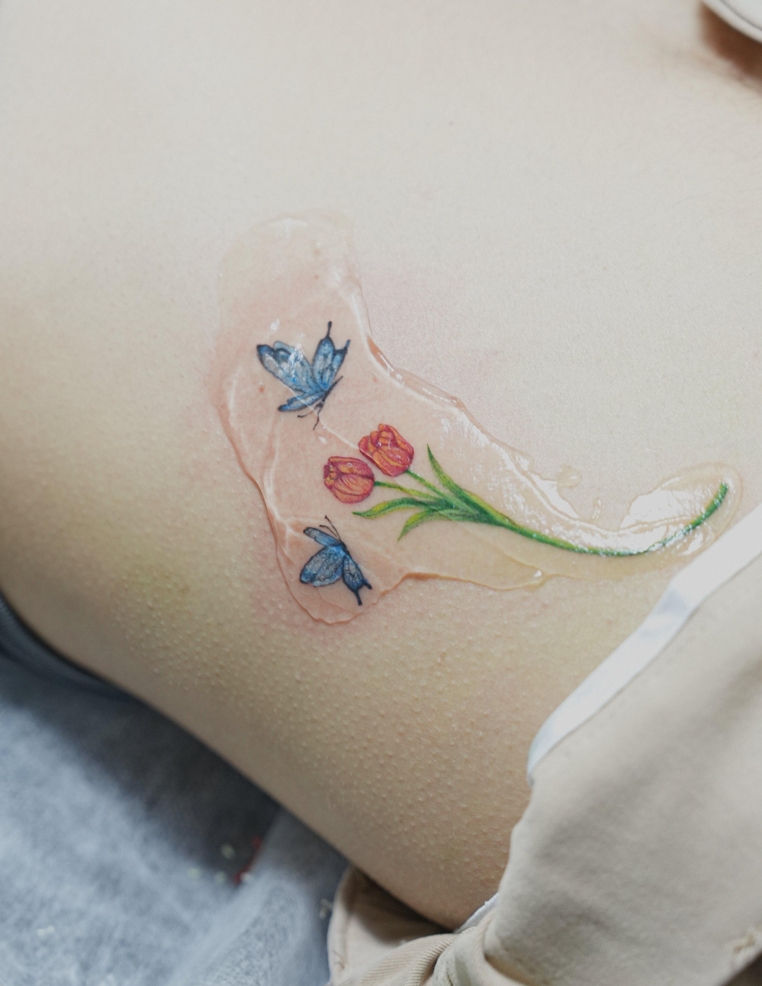 รอยสักผีเสื้อสีสันสดใสสไตล์ Fine Line จาก Let’s Tatt Studio / Fine line butterfly color tattoo by Let’s Tatt Studio Chiang Mai