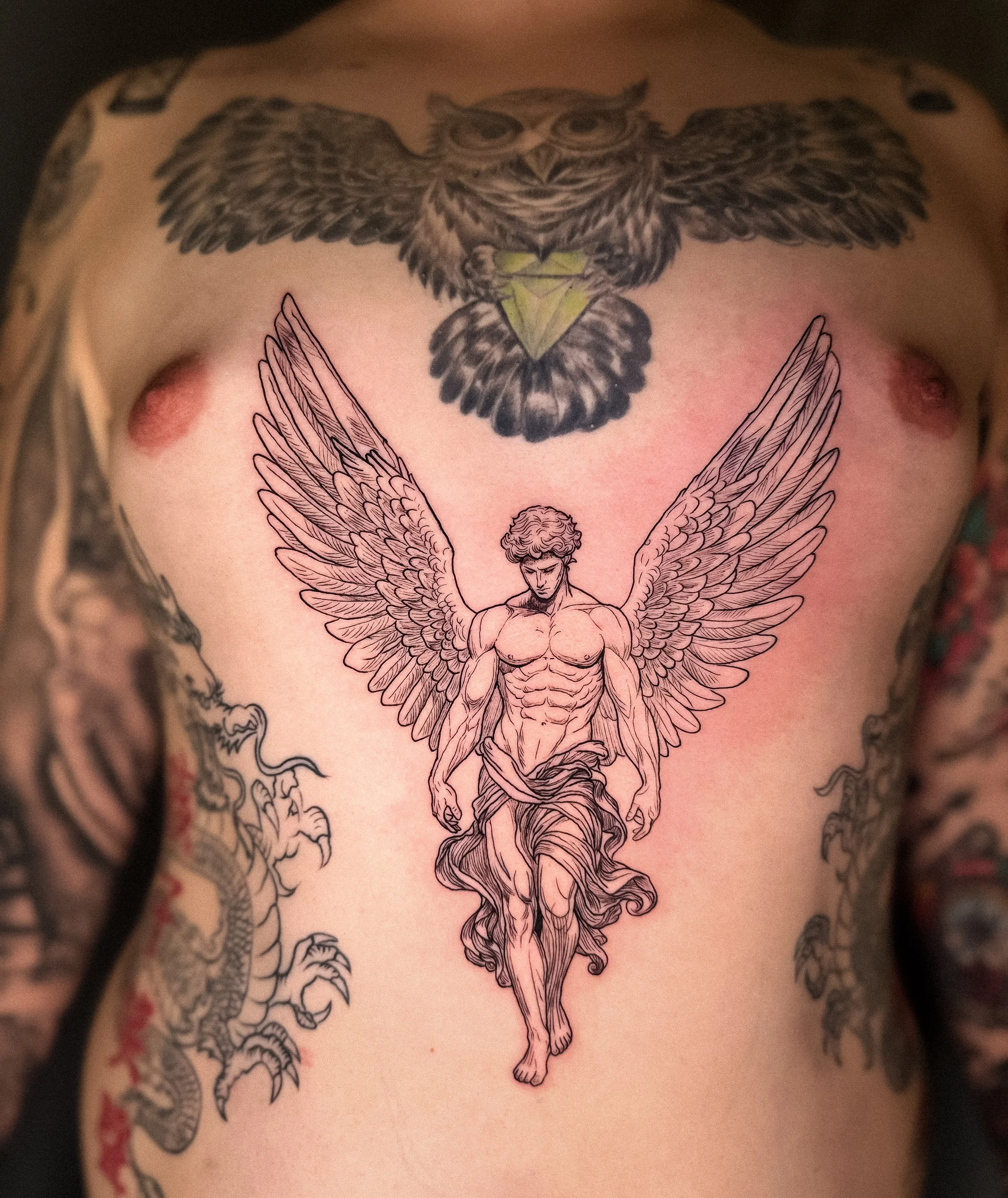 Fallen angel tattoo by Let’s Tatt Studio Chiang Mai