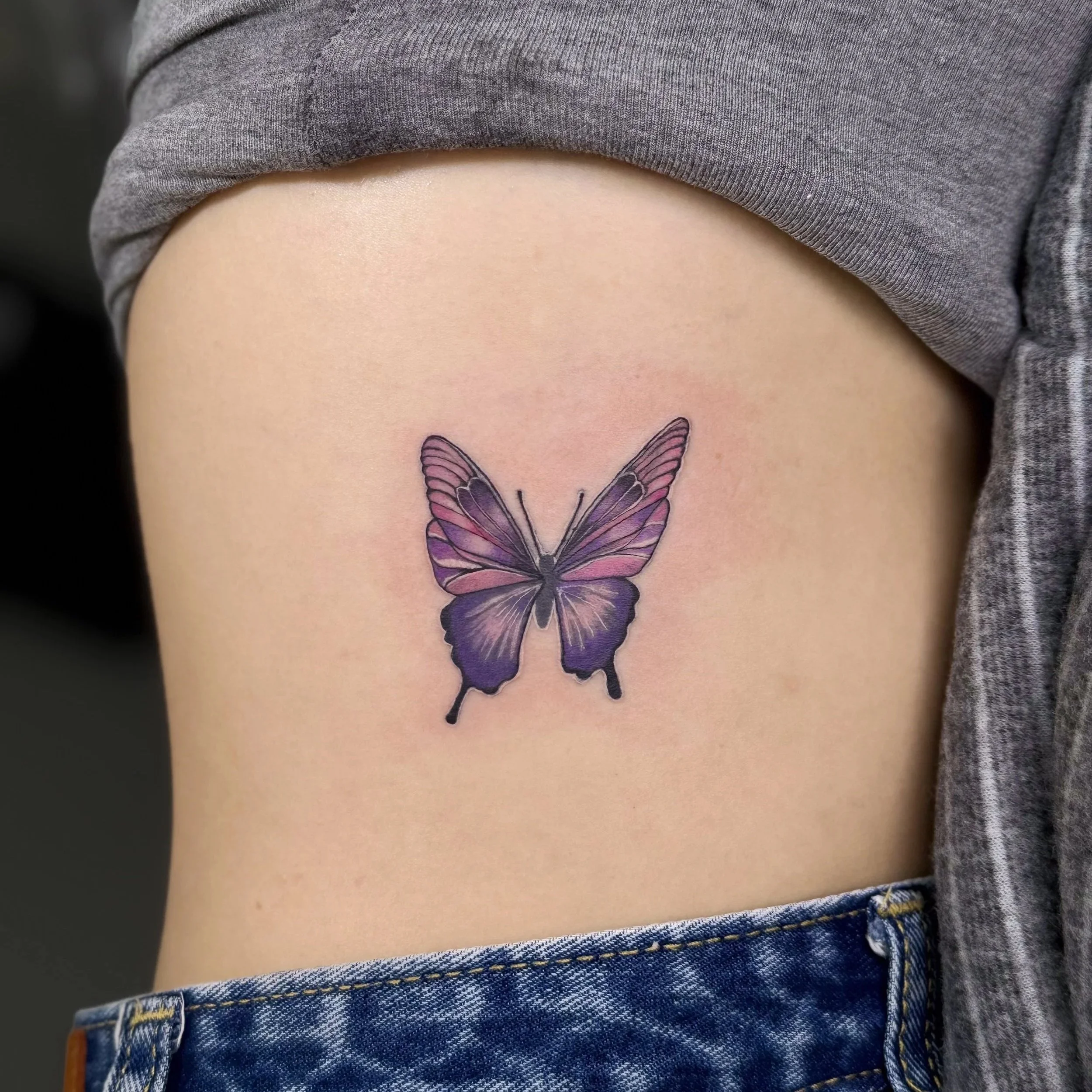 รอยสักผีเสื้อสไตล์ งานเติมสีจาก Let’s Tatt Studio / Fine line butterfly color tattoo by Let’s Tatt Studio Chiang Mai