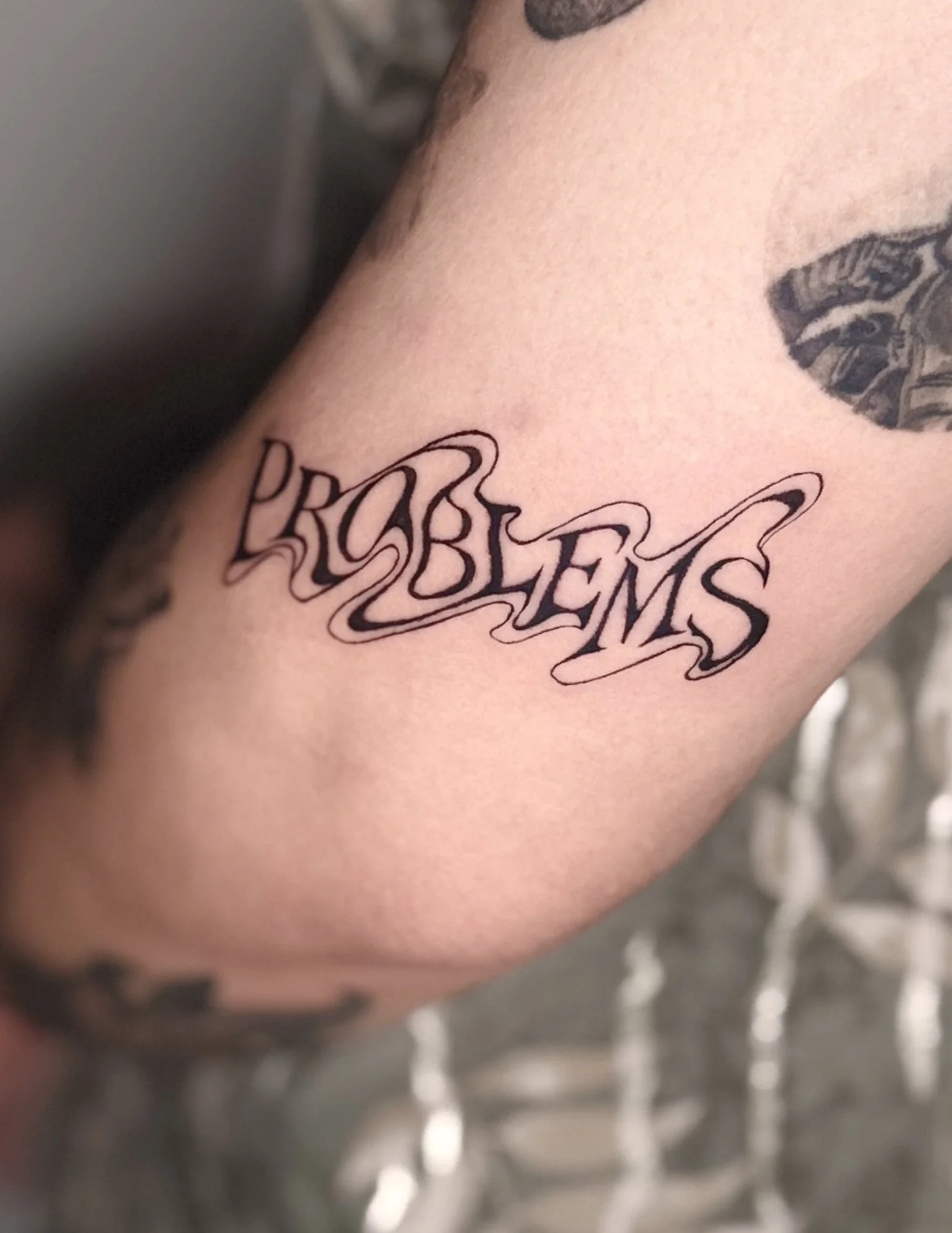 Gothic lettering tattoo by Let’s Tatt Studio Chiang Mai