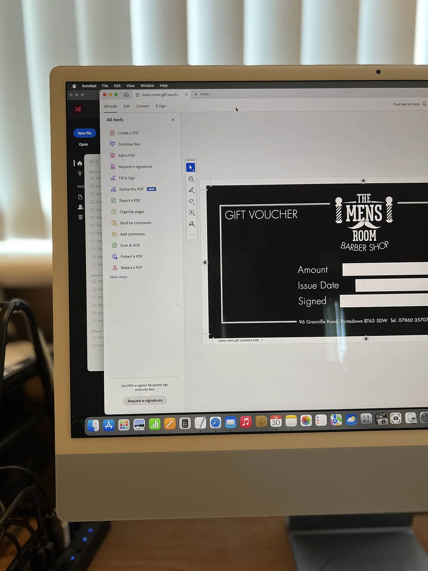 Close-up of my Mac computer checking a PDF proof before going to print for a commercial business in Craigavon.