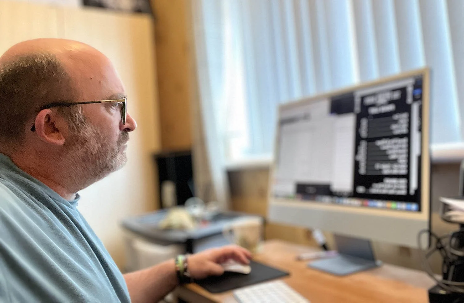 As a graphic designer serving County Armagh, I work on a gift voucher using an Apple Mac and the latest pre-press software.