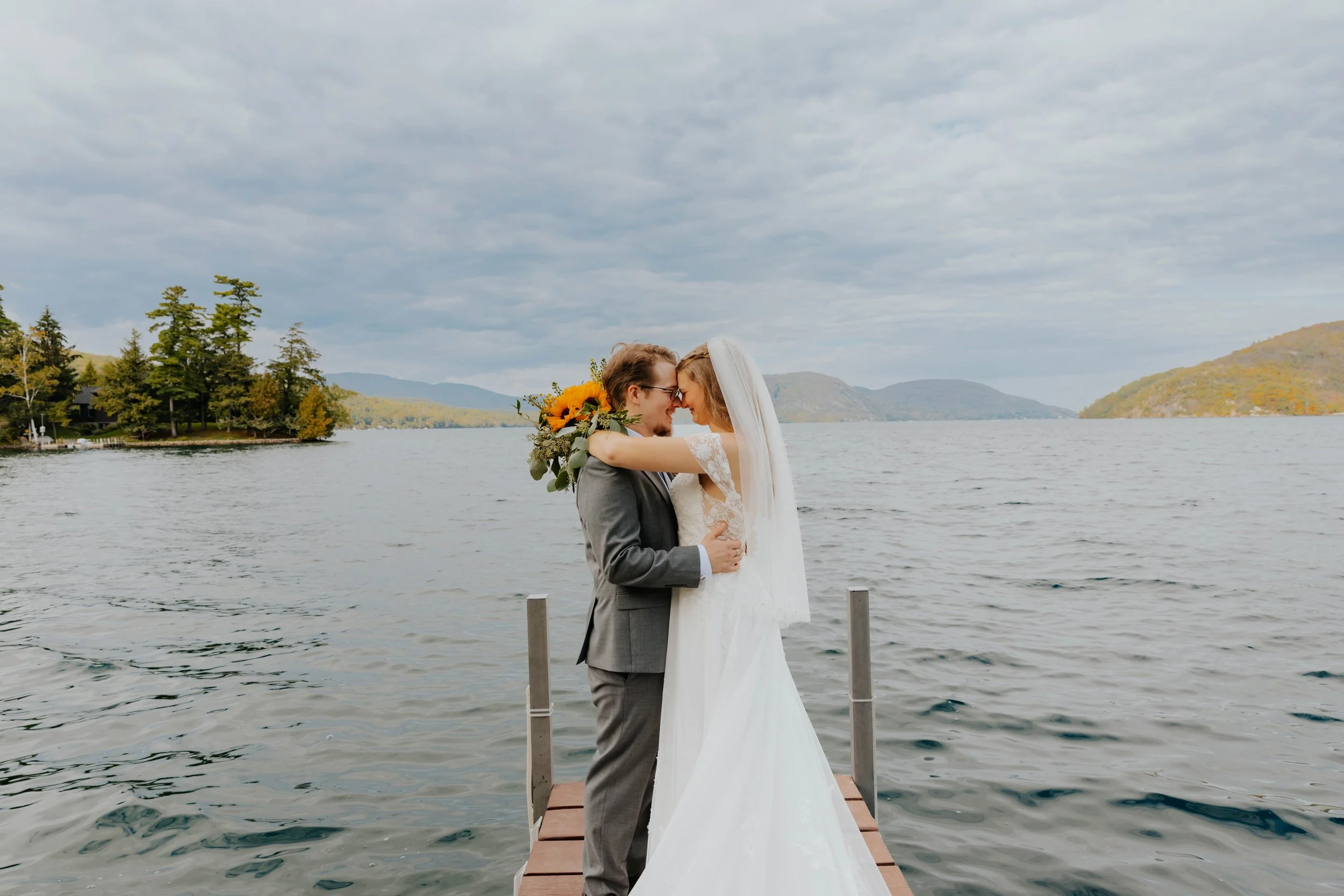 Bride and groom at a lake