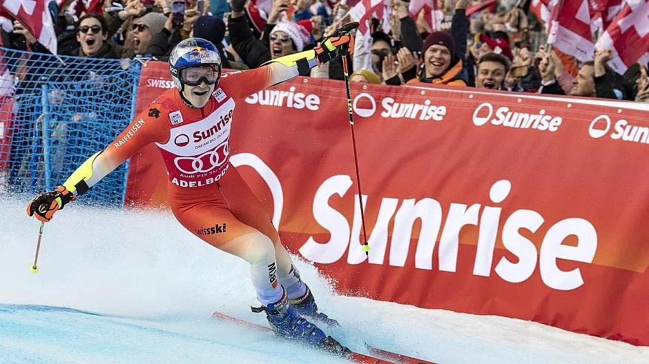 Marco Odermatt celebrates in the Sunrise finish area in Adelboden