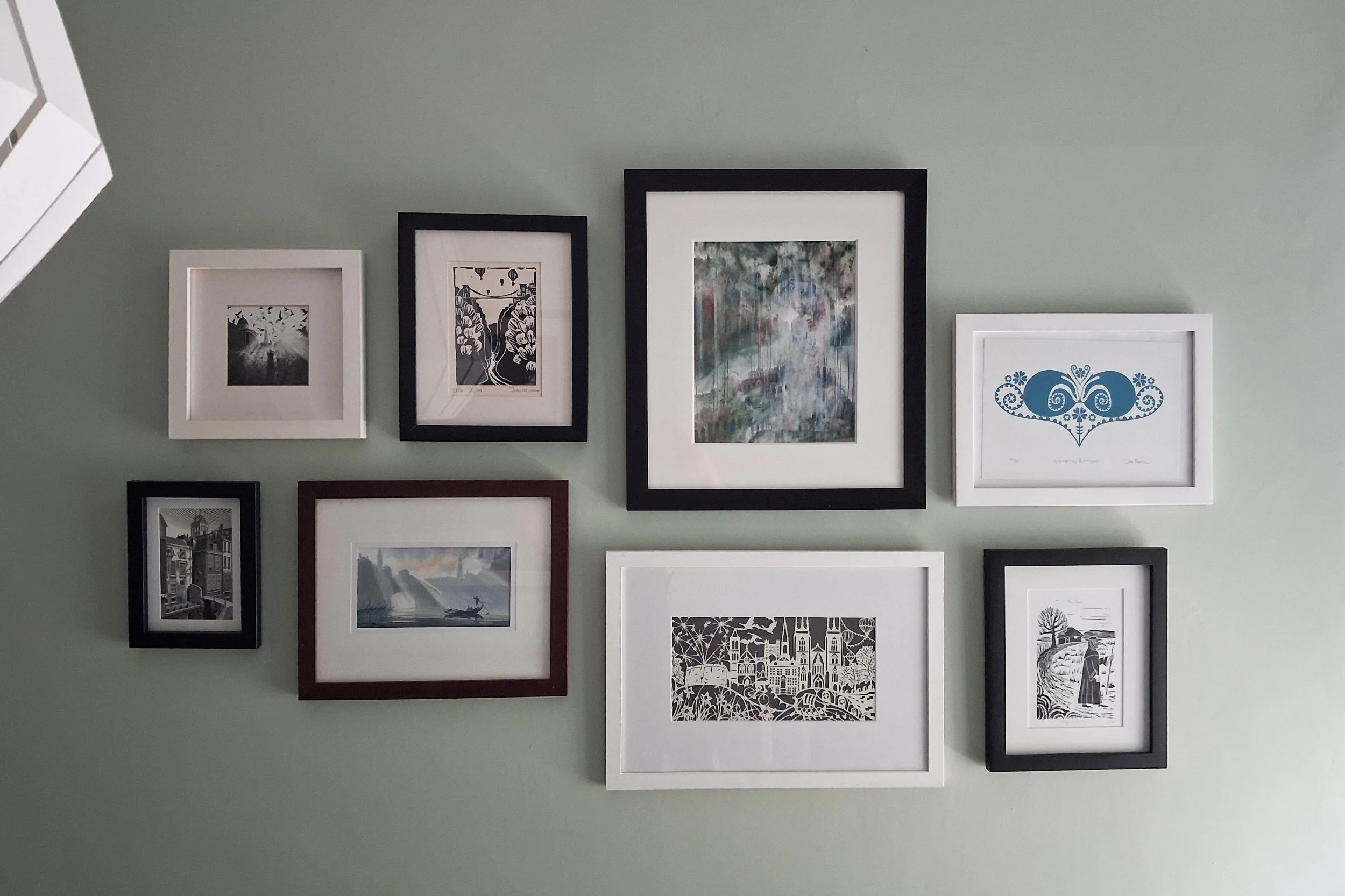 Bedroom wall montage design, designed and picture hanging and installation in Canonmills, Edinburgh.