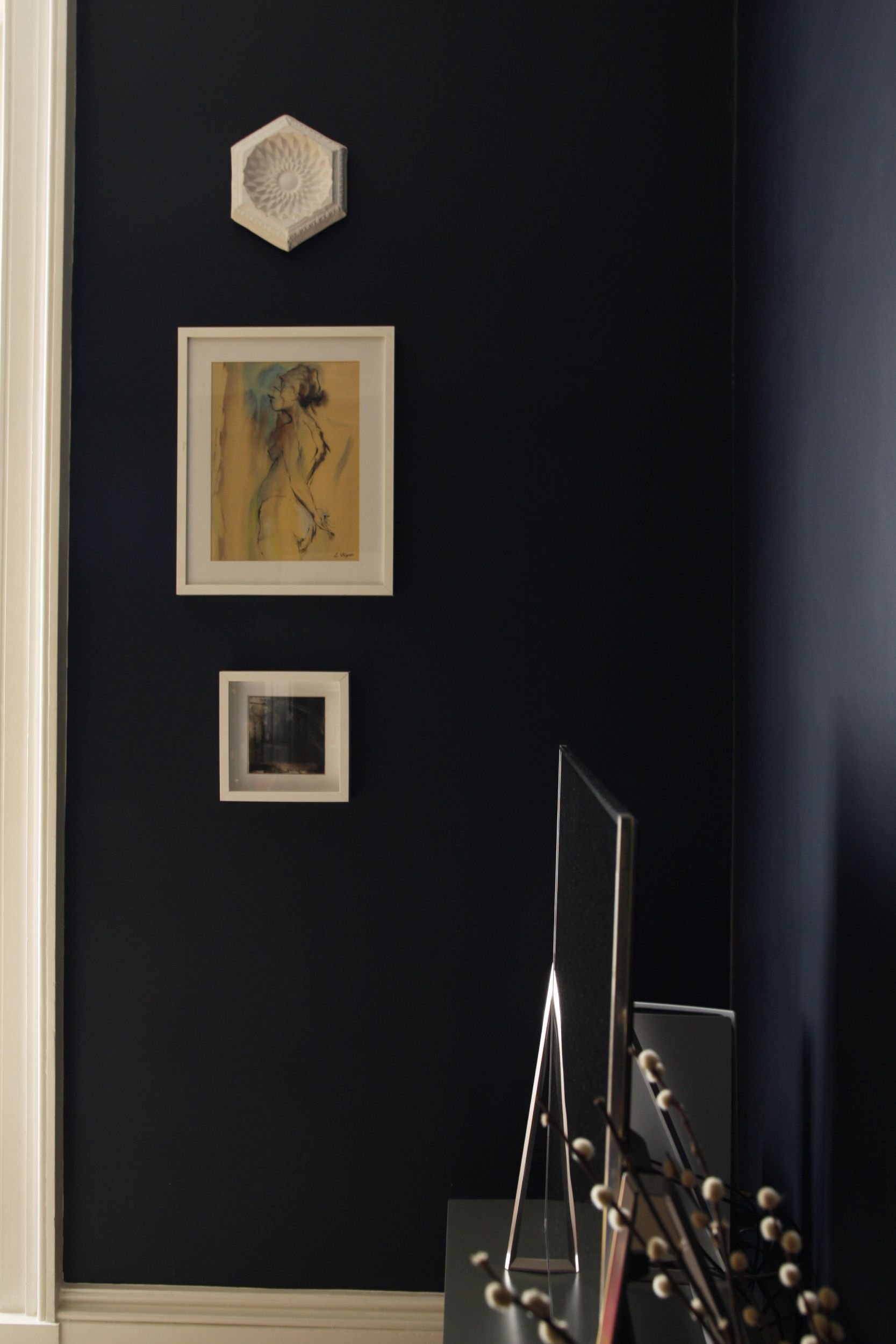 Vertical picture hanging installation. 